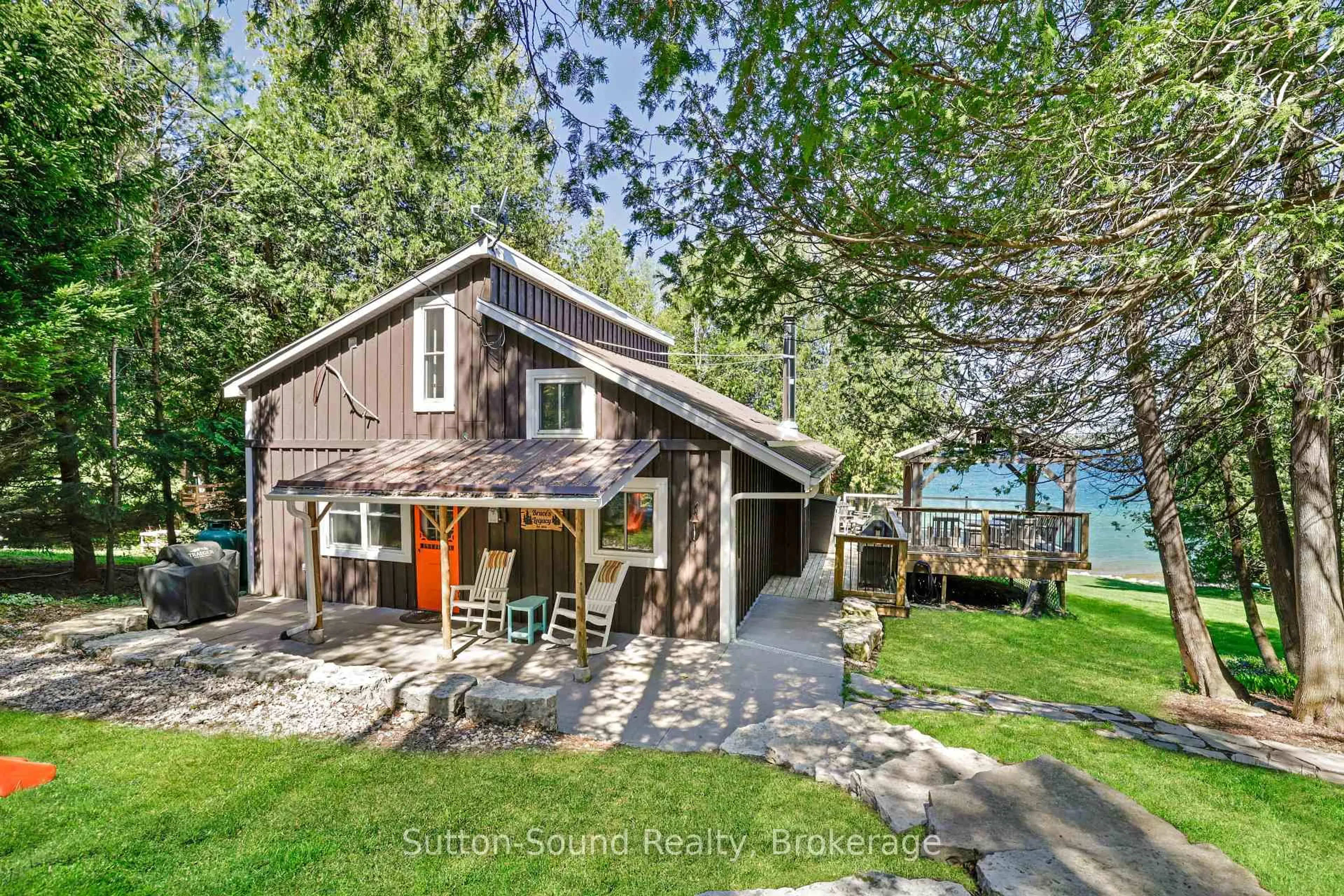 A pic from outside/outdoor area/front of a property/back of a property/a pic from drone, water/lake/river/ocean view for 109 Dahl St, Georgian Bluffs Ontario N0H 2T0