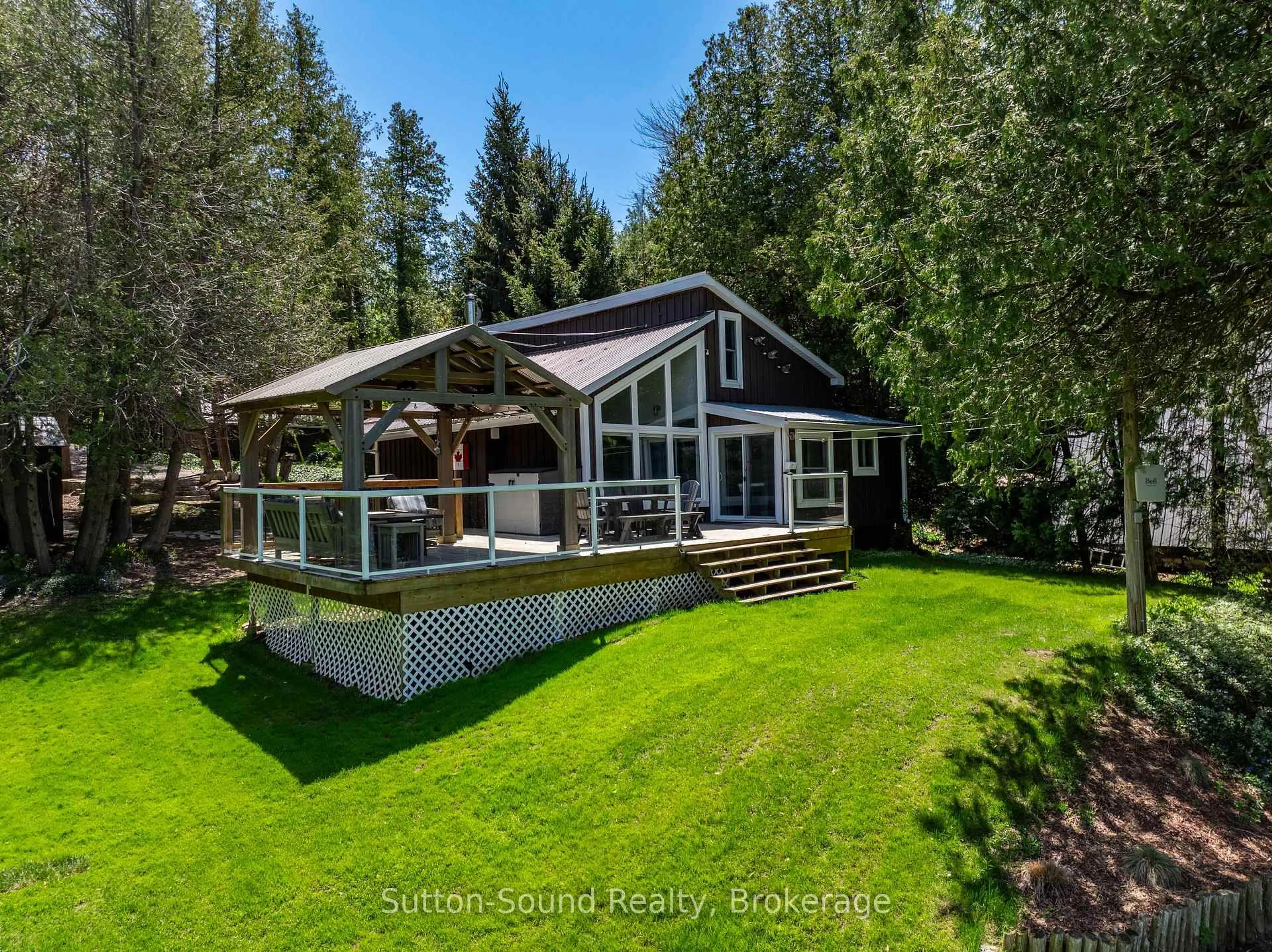A pic from outside/outdoor area/front of a property/back of a property/a pic from drone, water/lake/river/ocean view for 109 Dahl St, Georgian Bluffs Ontario N0H 2T0