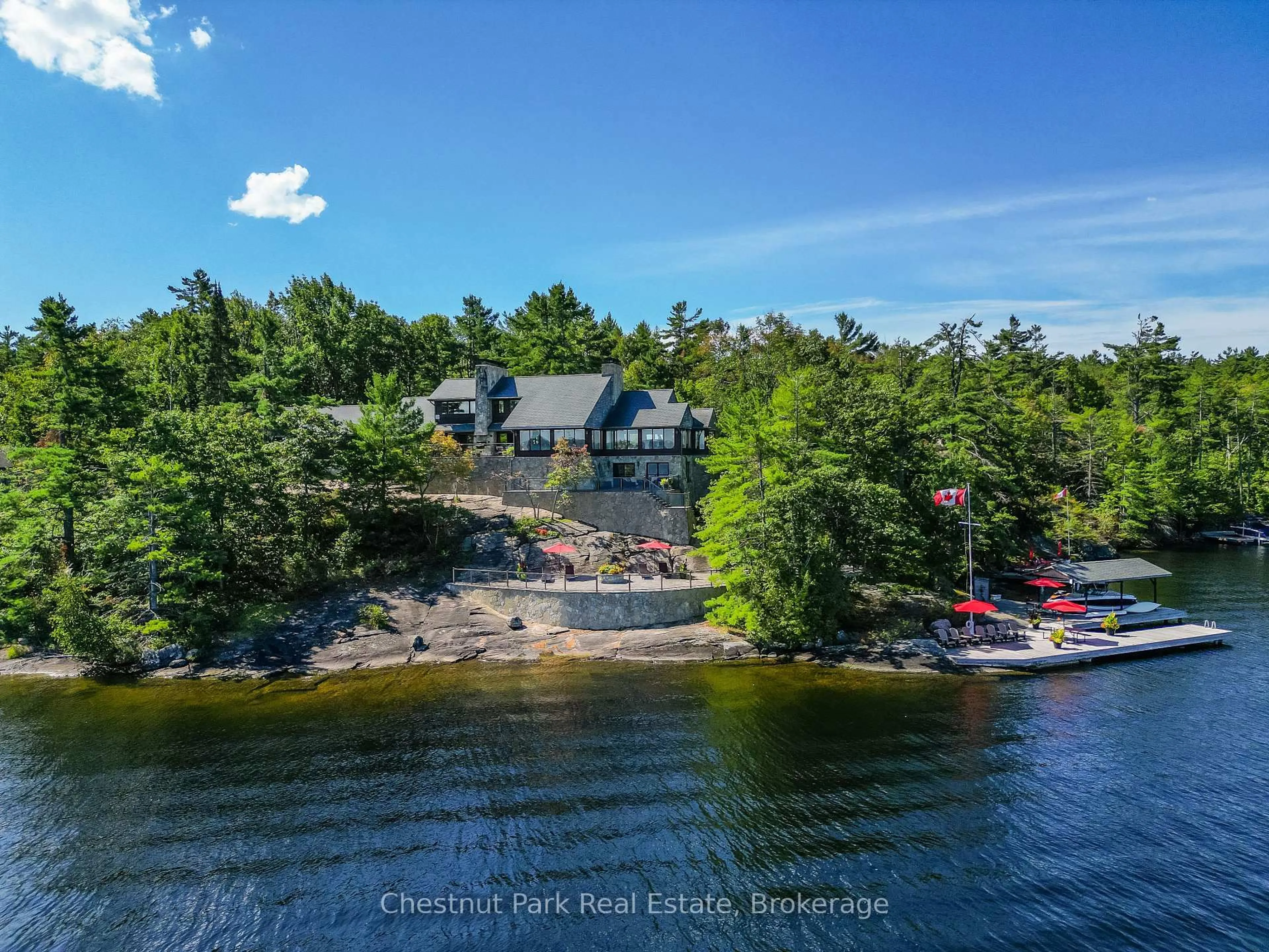 A pic from outside/outdoor area/front of a property/back of a property/a pic from drone, water/lake/river/ocean view for 1088 Lawland Heights Rd #2, Gravenhurst Ontario P1P 1R2