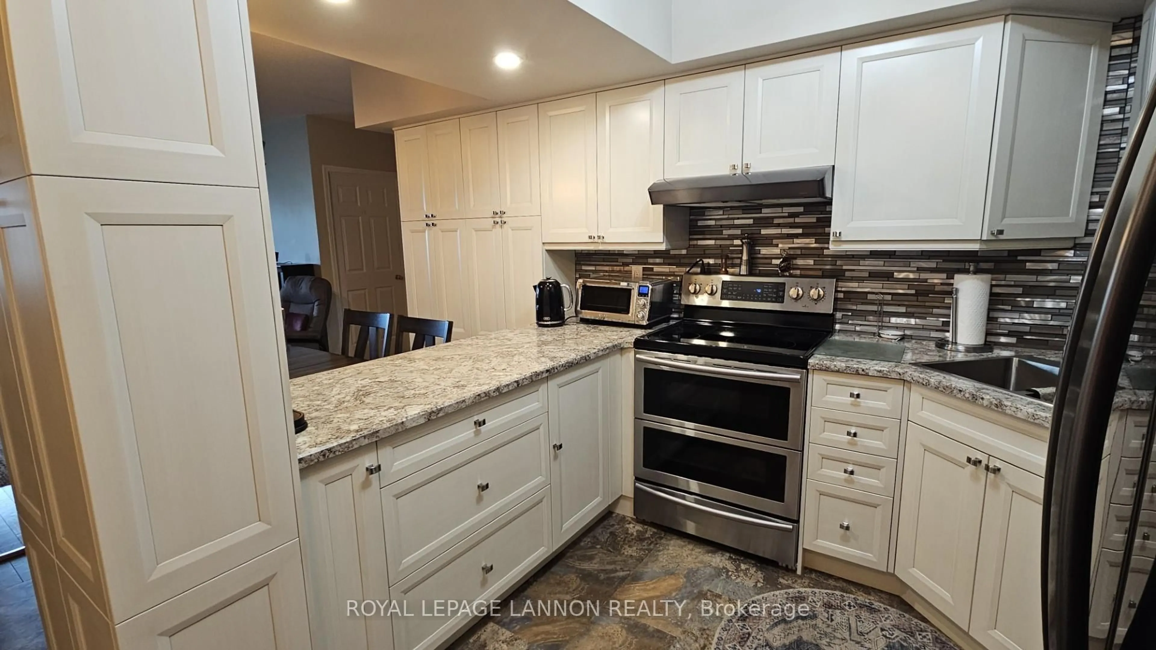 Open concept kitchen, ceramic/tile floor for 315 Hilldale Road ##112, Thunder Bay Ontario P7G 1J7
