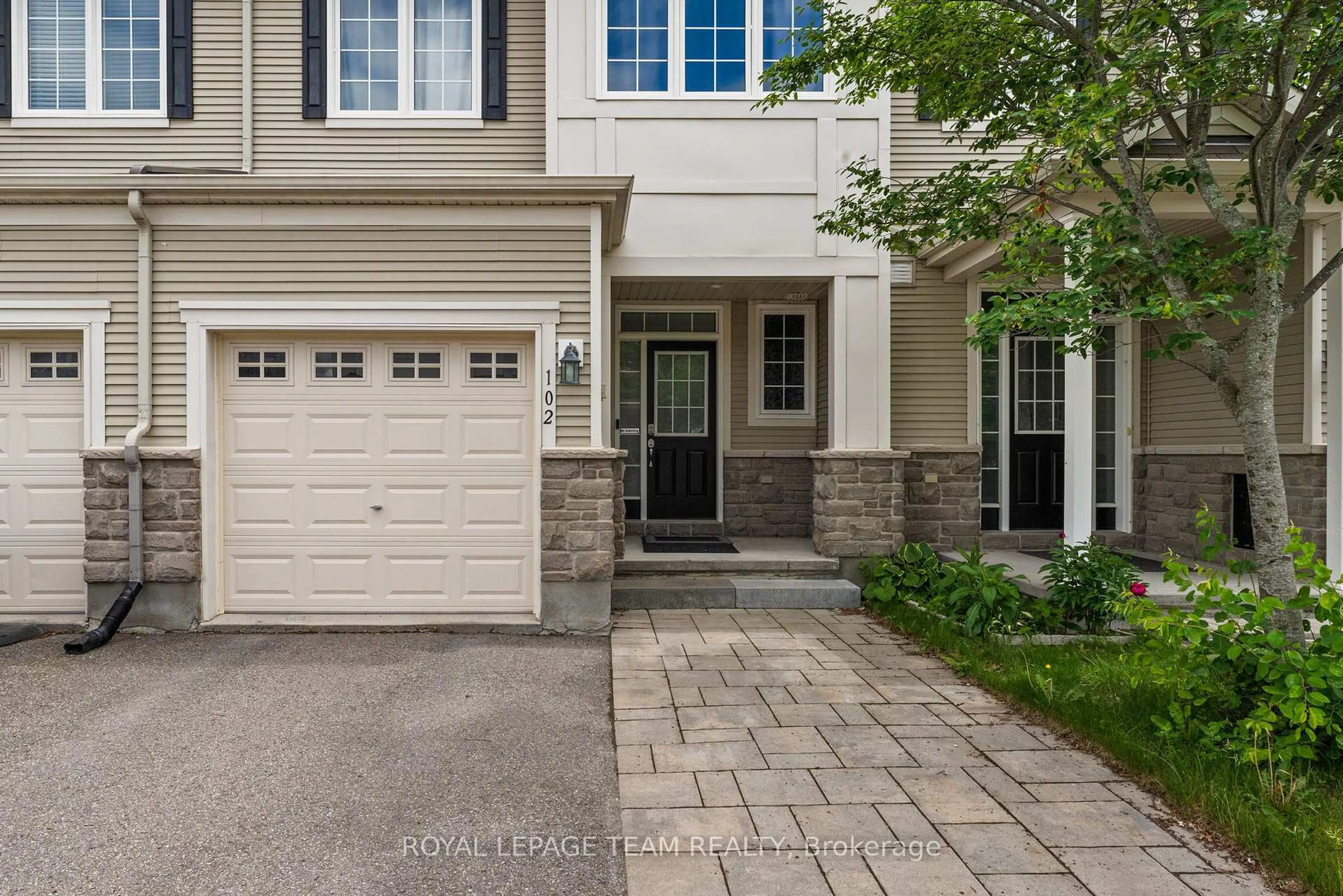 Home with brick exterior material, street for 102 Lochnaw Private, Ottawa Ontario K2J 5X6