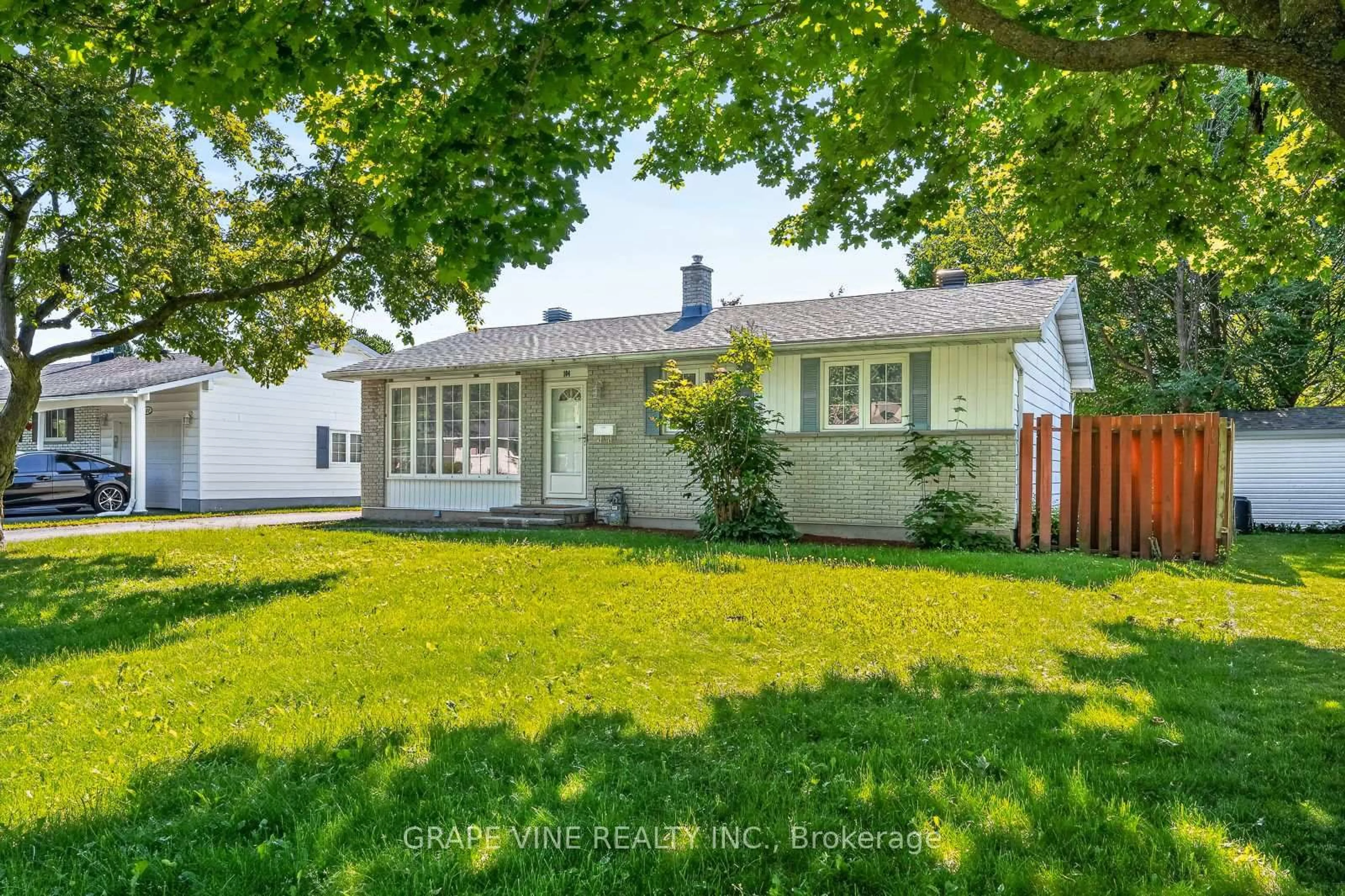 Home with vinyl exterior material, street for 104 Oriole Ave, Kanata Ontario K2L 1E7