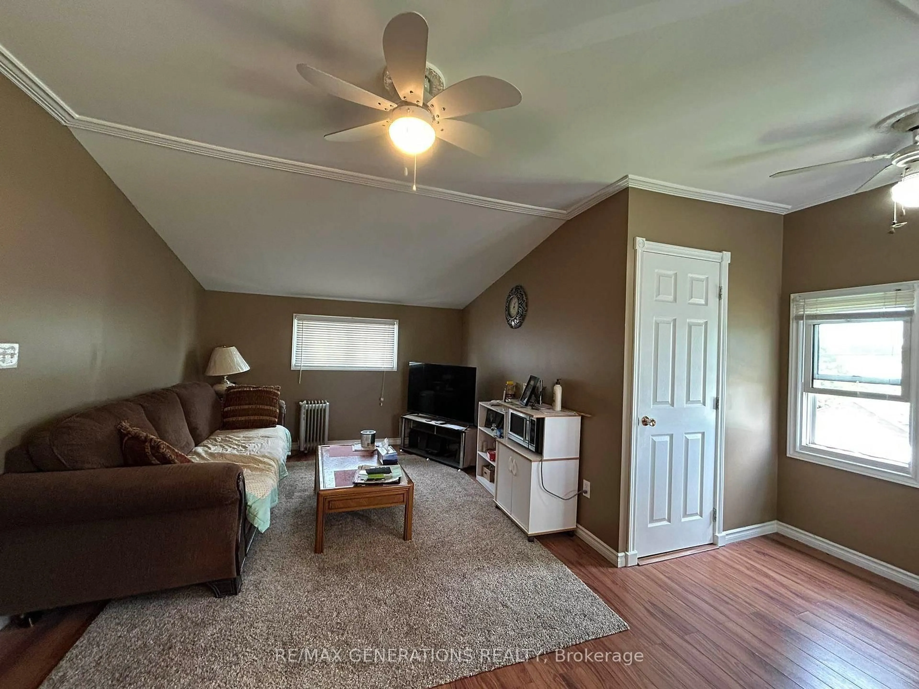 Living room with furniture, wood/laminate floor for 208 MACKENZIE Ave, Atikokan Ontario P0T 1C0
