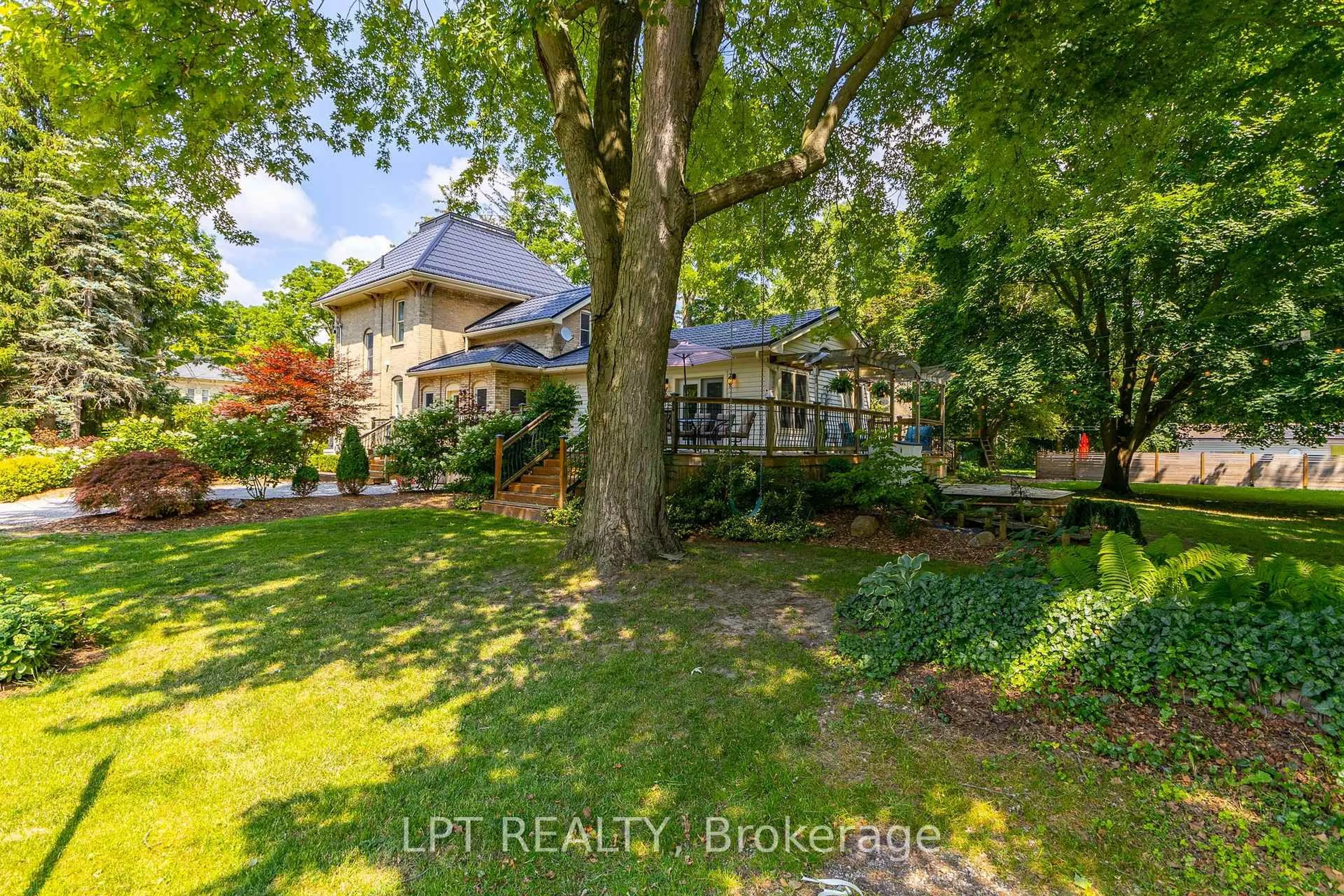 A pic from outside/outdoor area/front of a property/back of a property/a pic from drone, unknown for 283 Hastings St, North Middlesex Ontario N0M 2K0