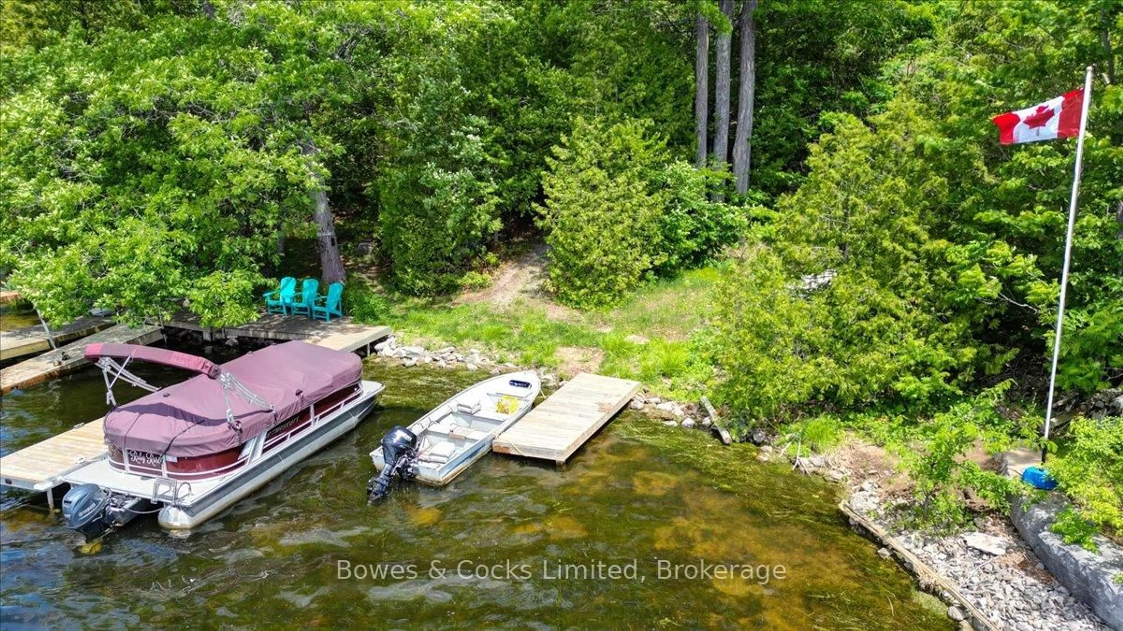 A pic from outside/outdoor area/front of a property/back of a property/a pic from drone, water/lake/river/ocean view for 10 Birch Terr, Trent Lakes Ontario K0L 1J0