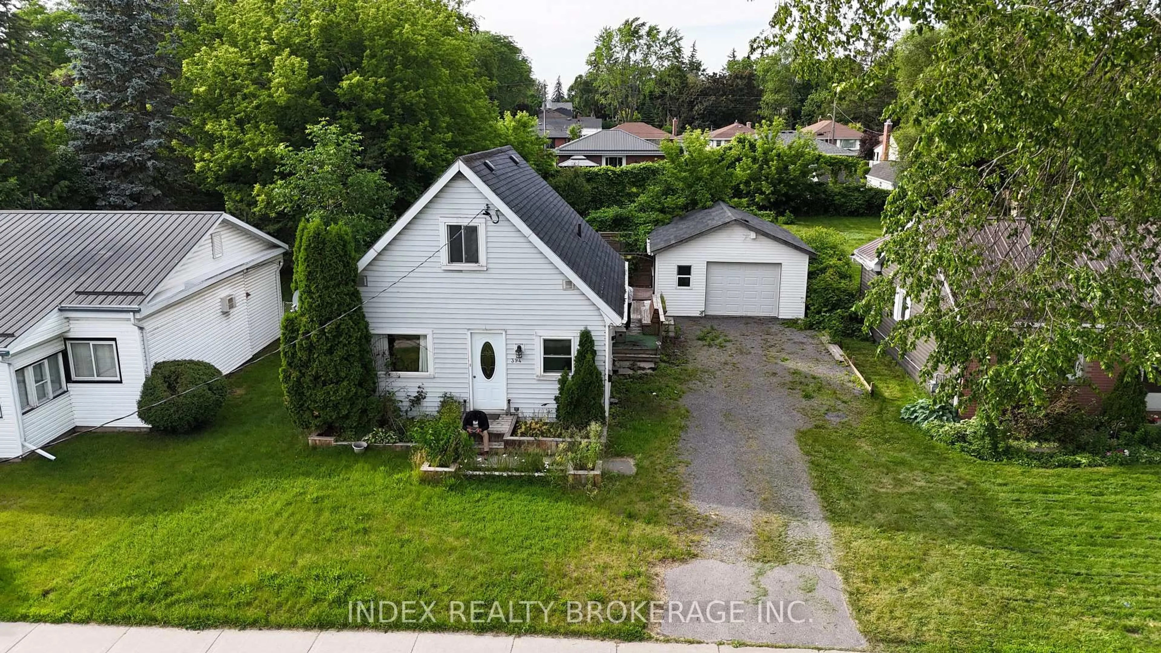A pic from outside/outdoor area/front of a property/back of a property/a pic from drone, street for 394 Bridge St, Belleville Ontario K8N 1P8