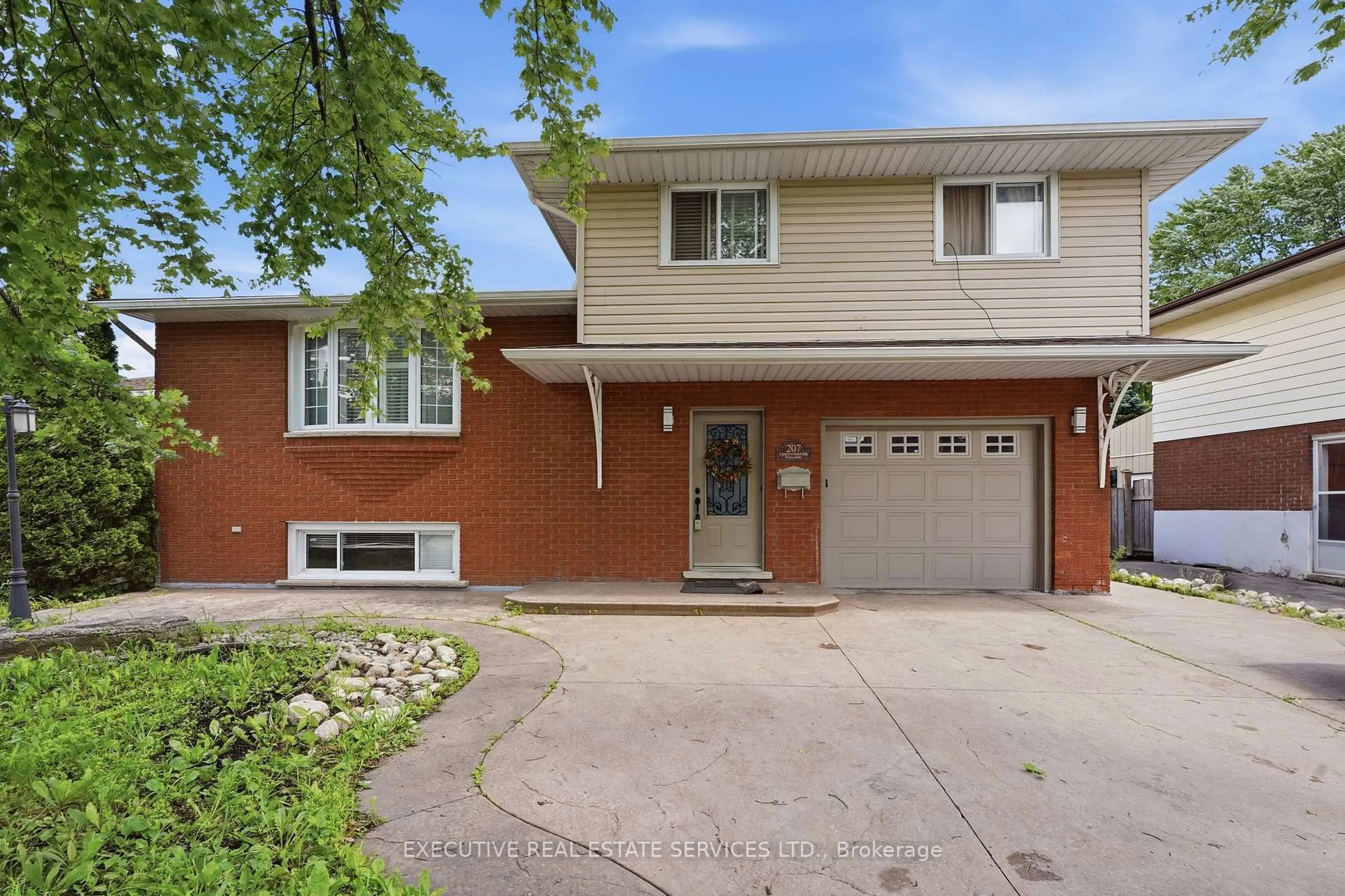 Home with brick exterior material, street for 207 Christopher Dr, Cambridge Ontario N1R 4S6