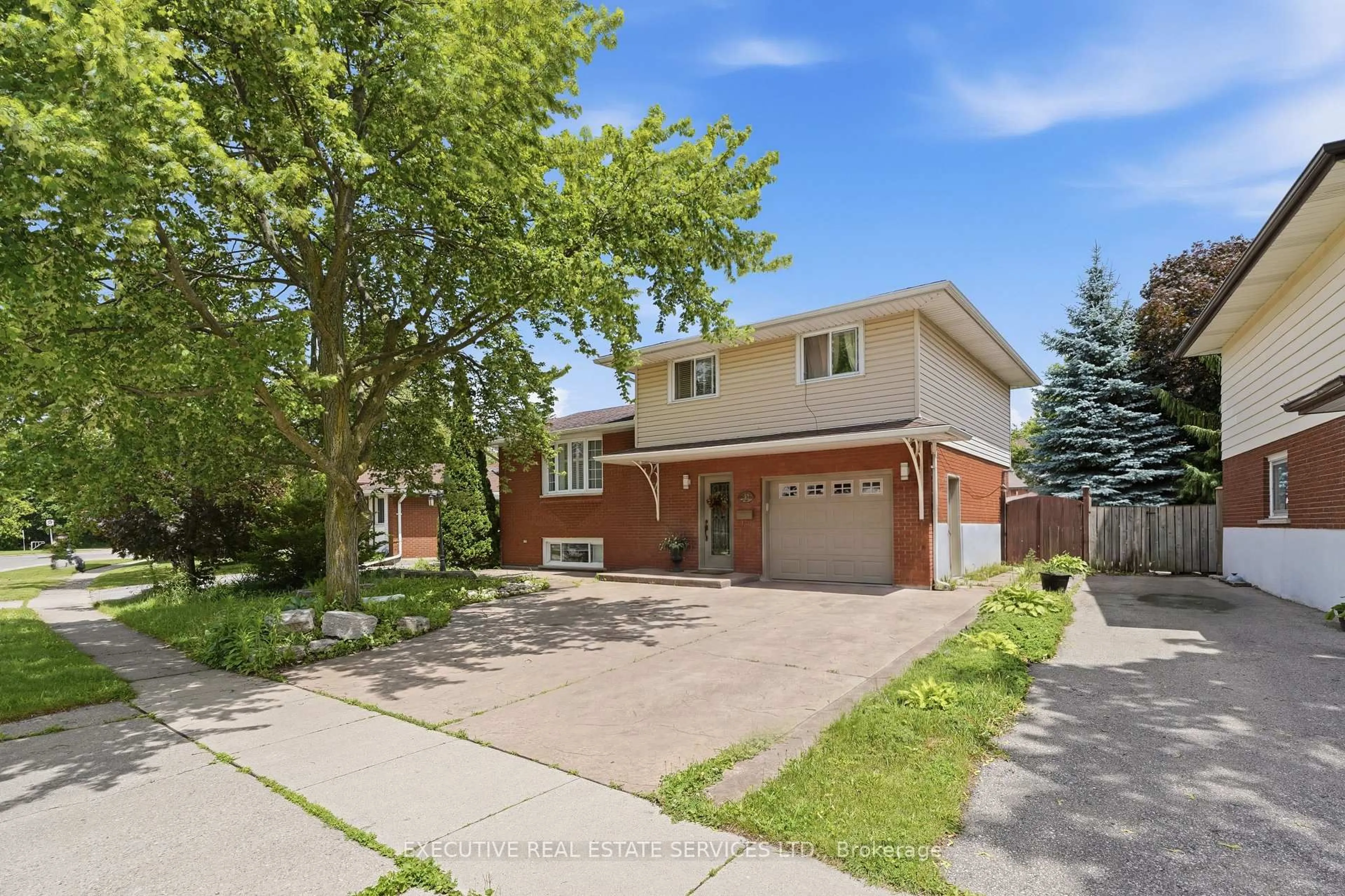 Home with brick exterior material, street for 207 Christopher Dr, Cambridge Ontario N1R 4S6