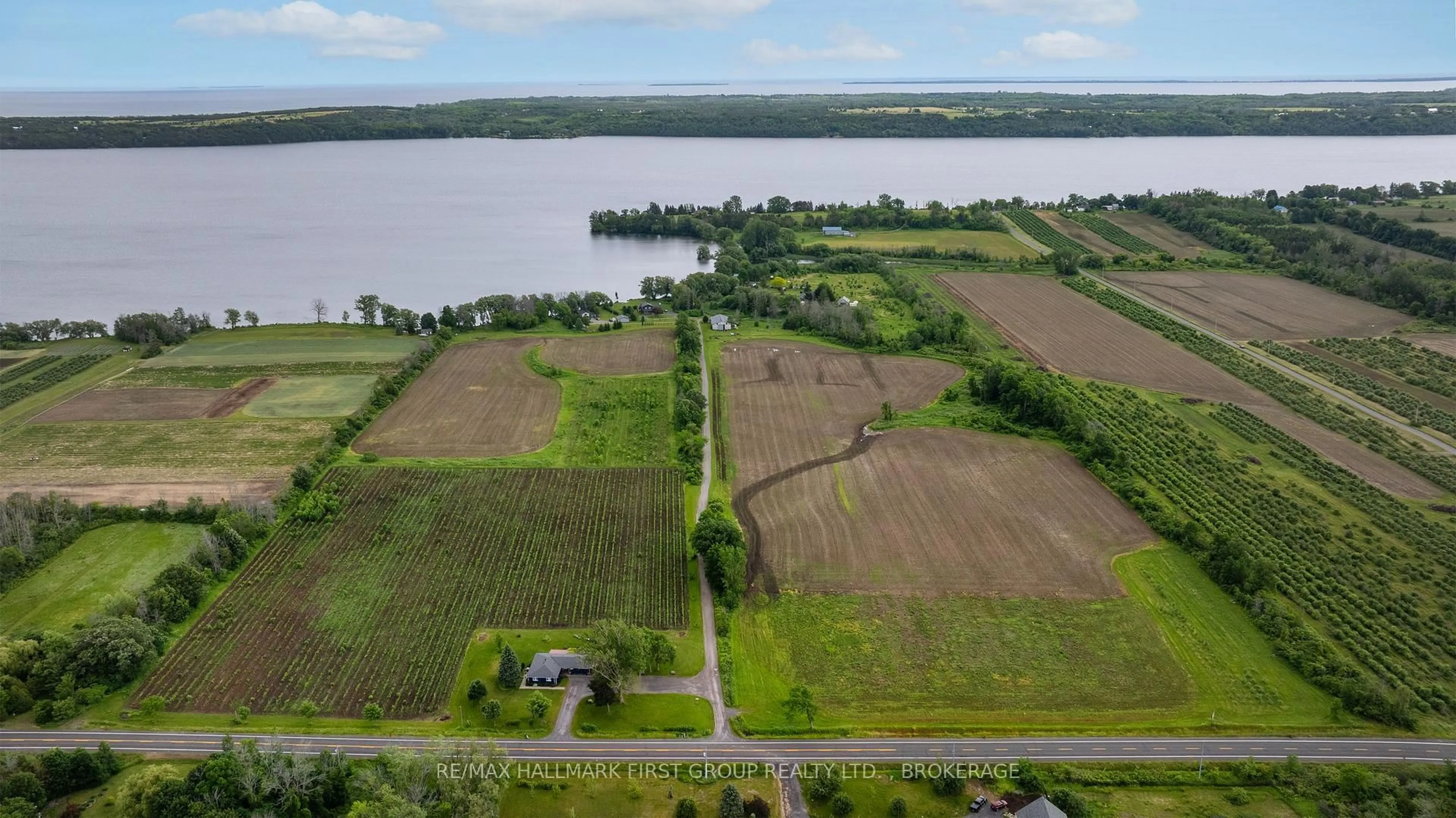 A pic from outside/outdoor area/front of a property/back of a property/a pic from drone, water/lake/river/ocean view for 9656 Loyalist Pkwy, Bath Ontario K0H 1G0
