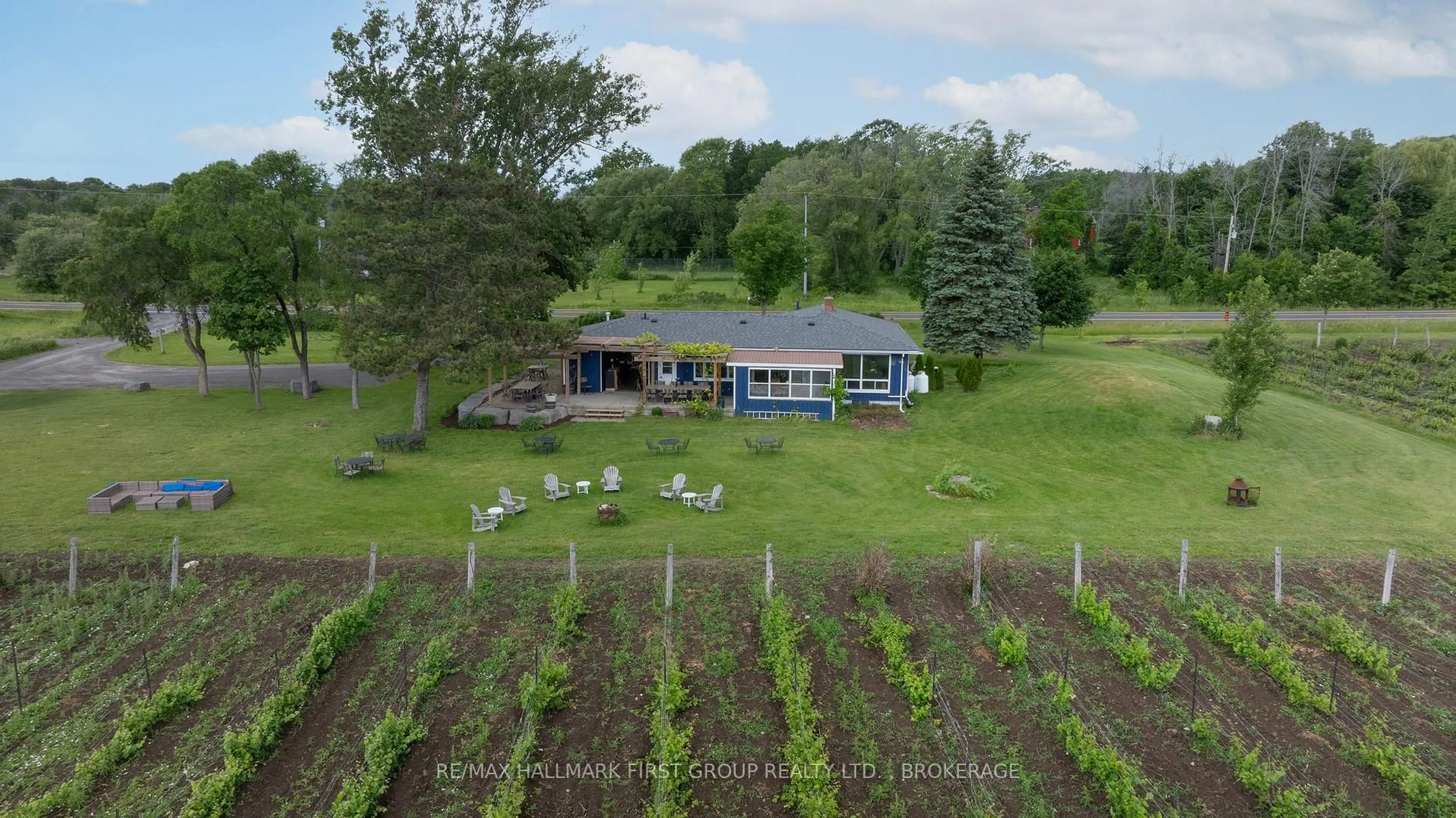 A pic from outside/outdoor area/front of a property/back of a property/a pic from drone, mountain view for 9656 Loyalist Pkwy, Bath Ontario K0H 1G0