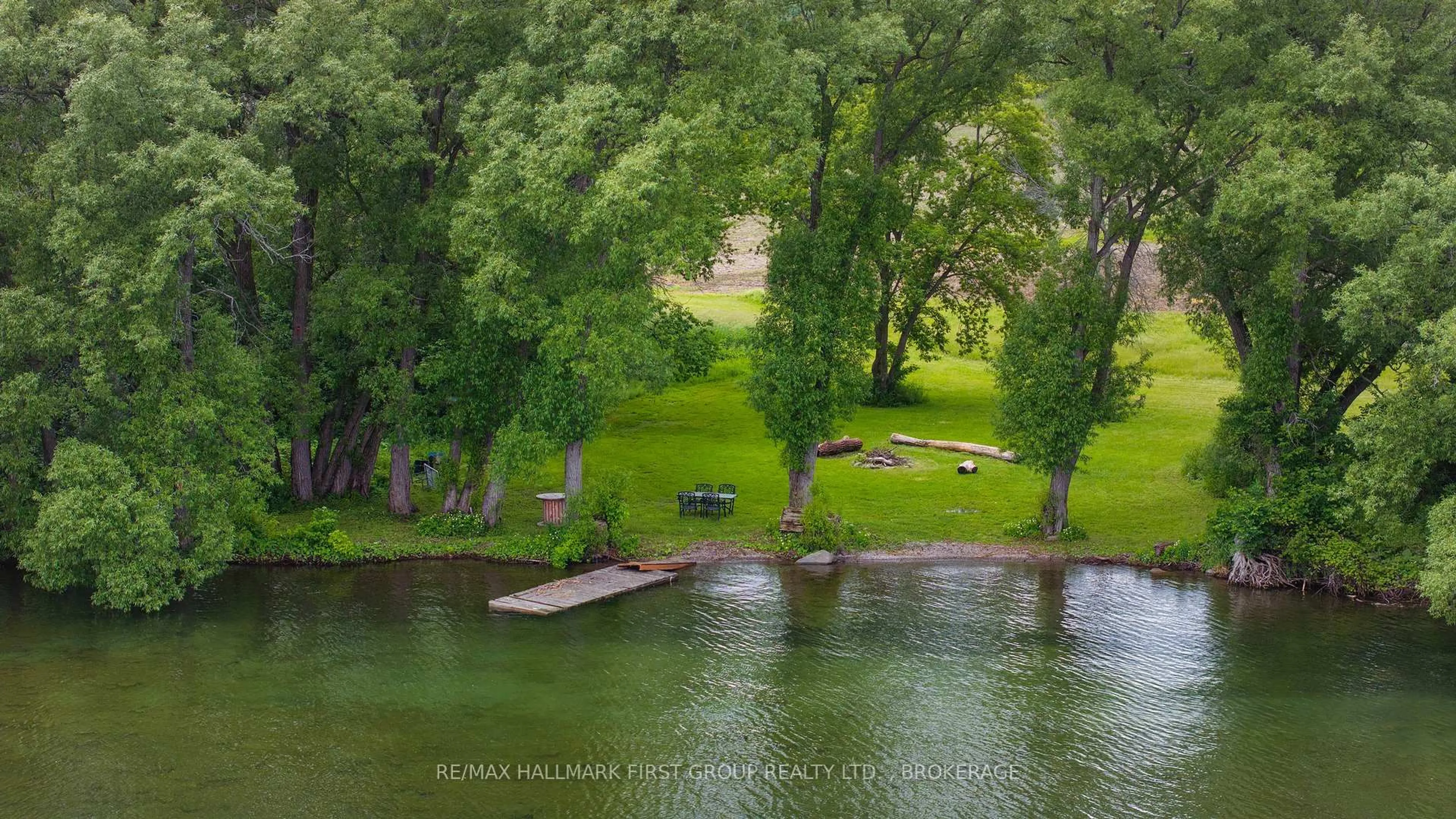 A pic from outside/outdoor area/front of a property/back of a property/a pic from drone, water/lake/river/ocean view for 9656 Loyalist Pkwy, Bath Ontario K0H 1G0