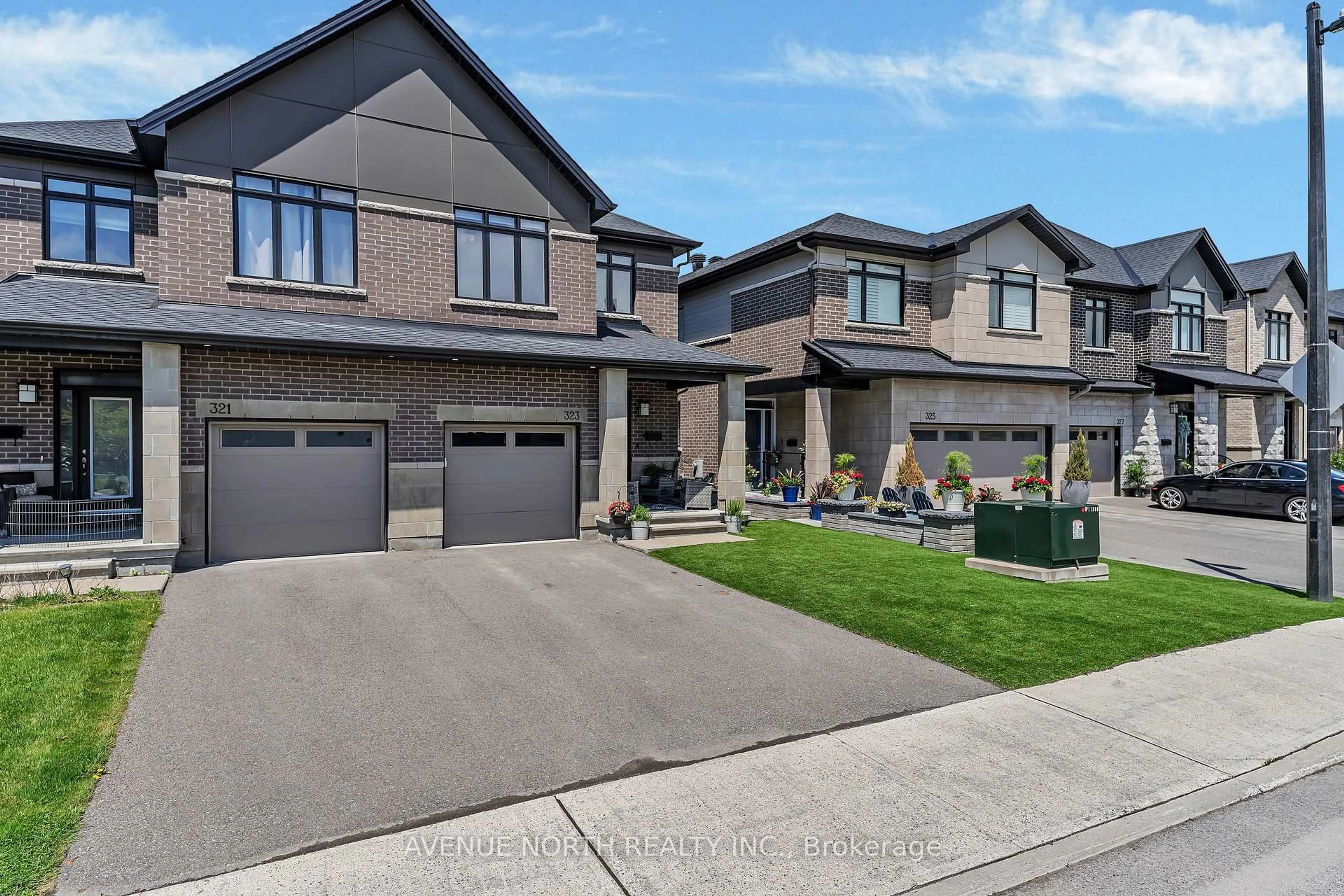 Home with brick exterior material, street for 323 Lysander Pl, Ottawa Ontario K1K 3X8