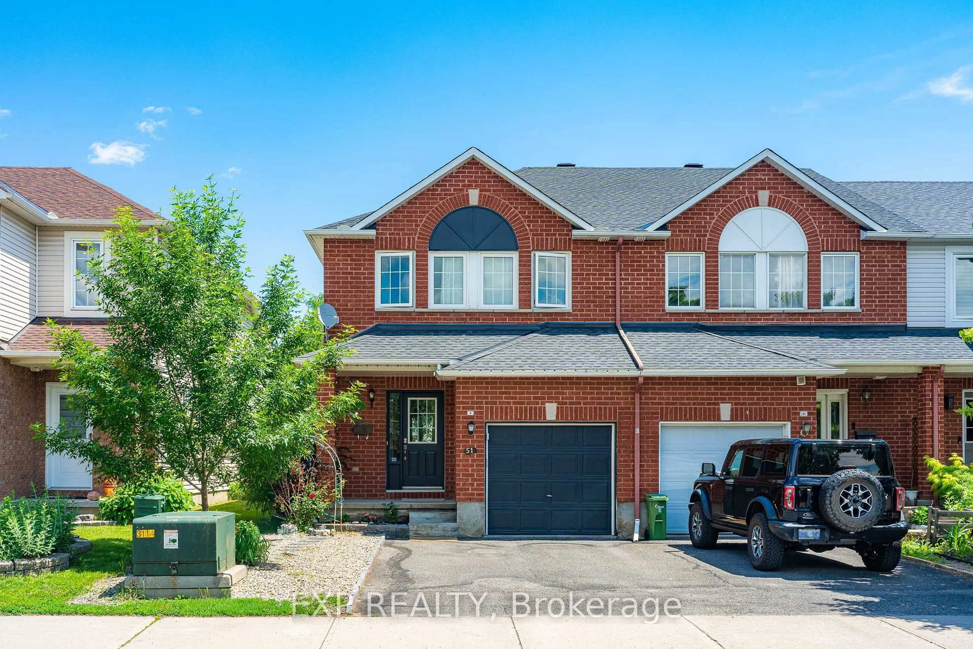 Home with brick exterior material, street for 51 Palmadeo Dr, Ottawa Ontario K2J 4Z3