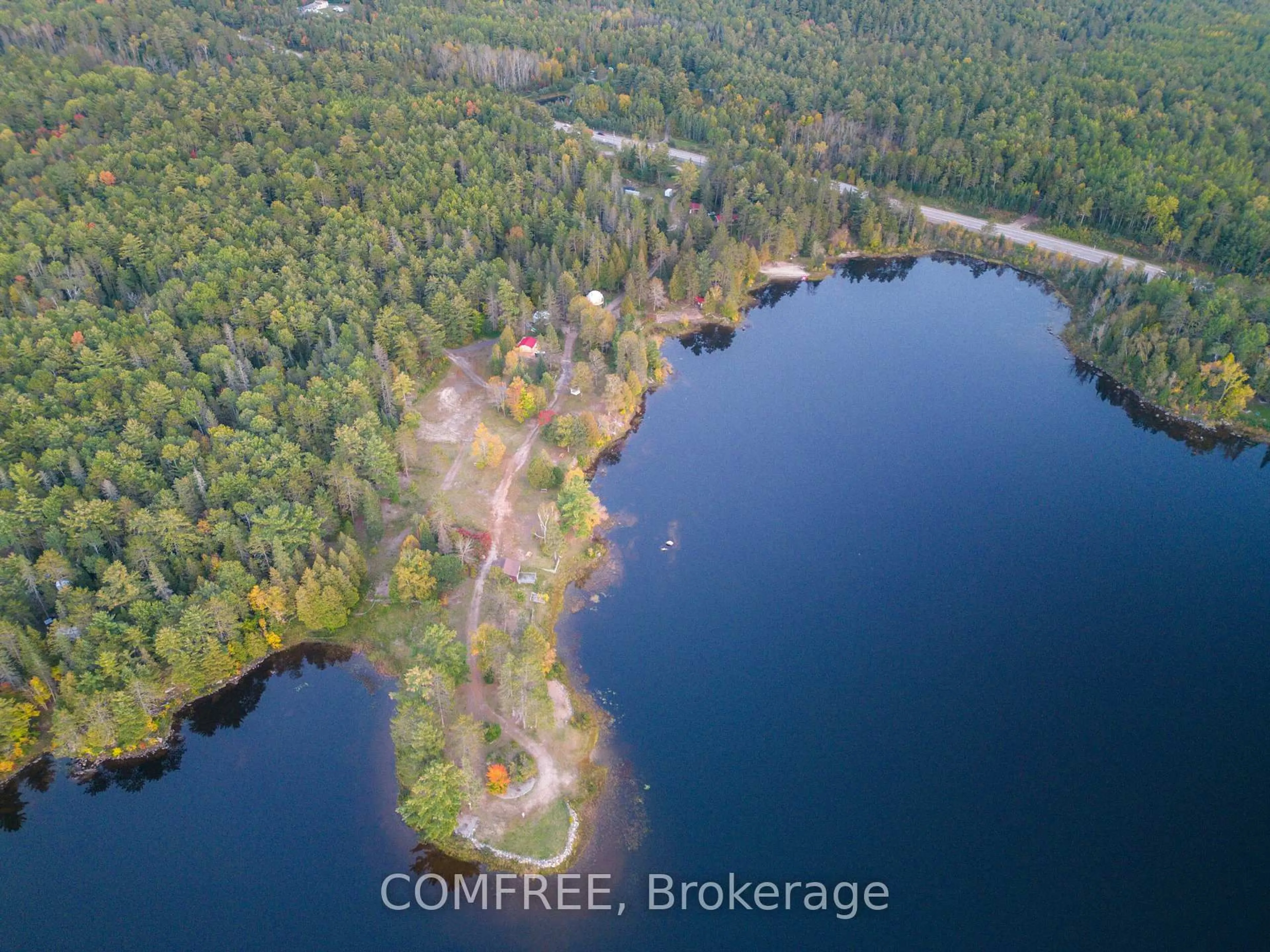A pic from outside/outdoor area/front of a property/back of a property/a pic from drone, water/lake/river/ocean view for 8863 Highway 17, Calvin Ontario P0H 2E0