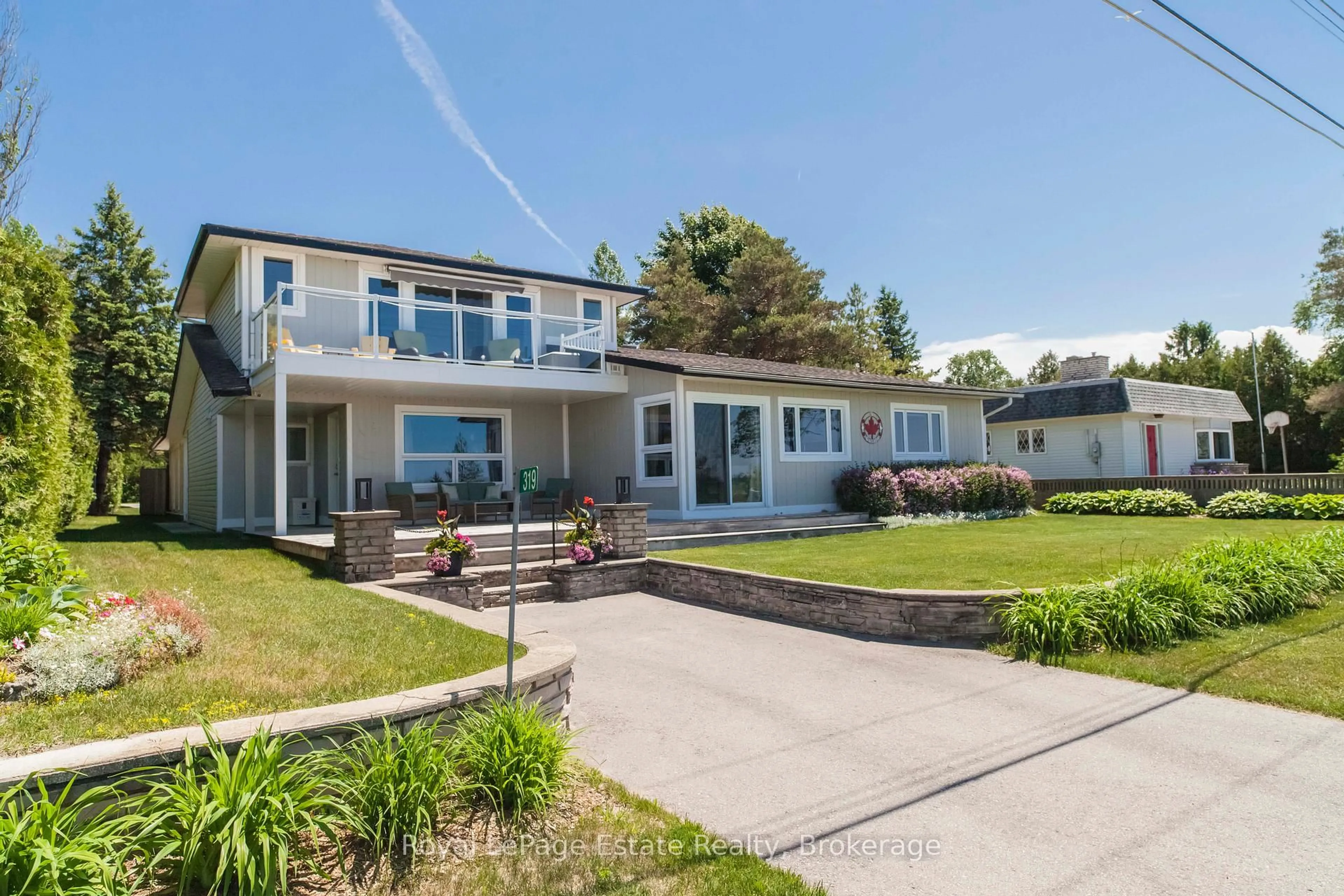 A pic from outside/outdoor area/front of a property/back of a property/a pic from drone, water/lake/river/ocean view for 319 Lakeshore Blvd, South Bruce Peninsula Ontario N0H 2G0