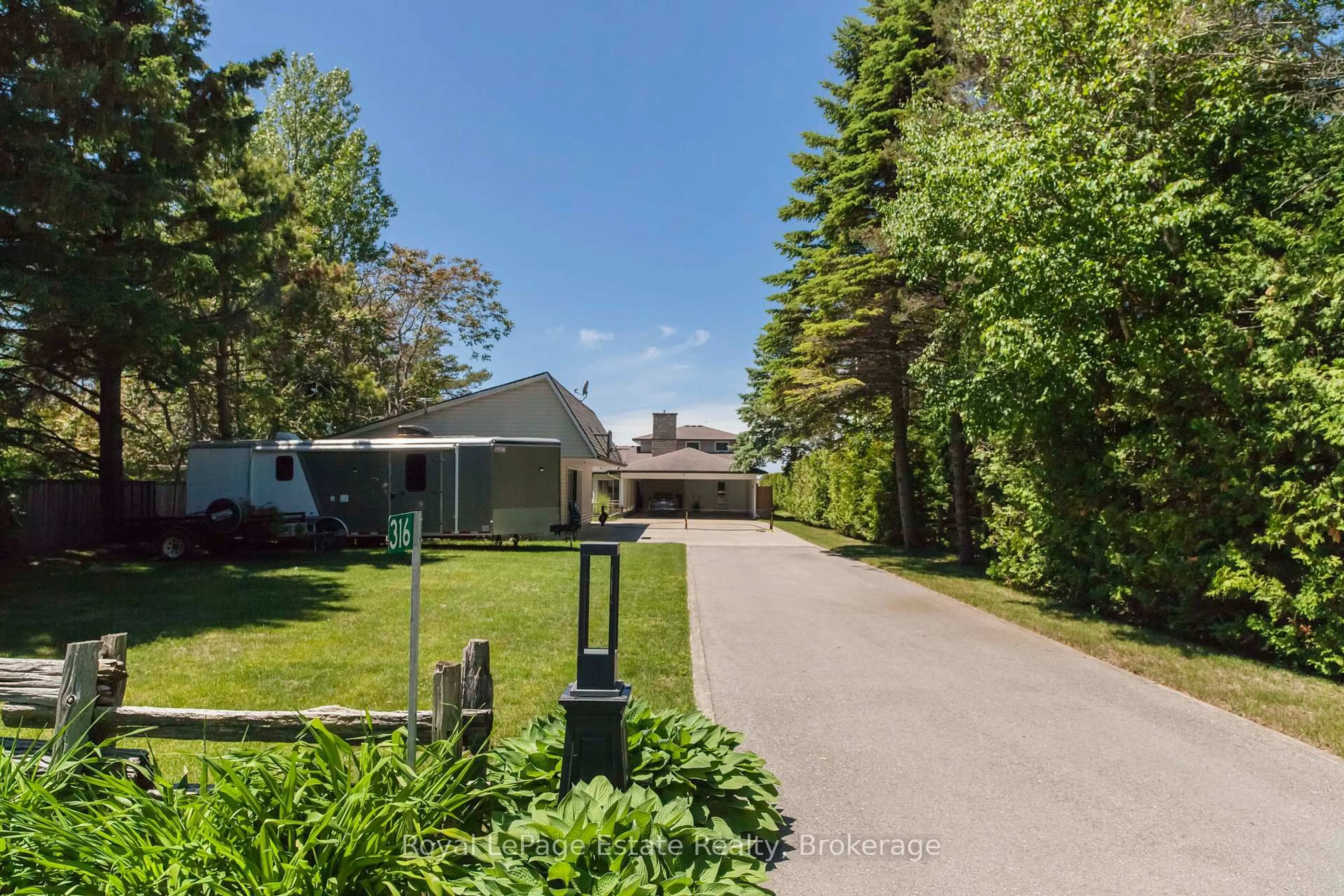 A pic from outside/outdoor area/front of a property/back of a property/a pic from drone, street for 319 Lakeshore Blvd, South Bruce Peninsula Ontario N0H 2G0
