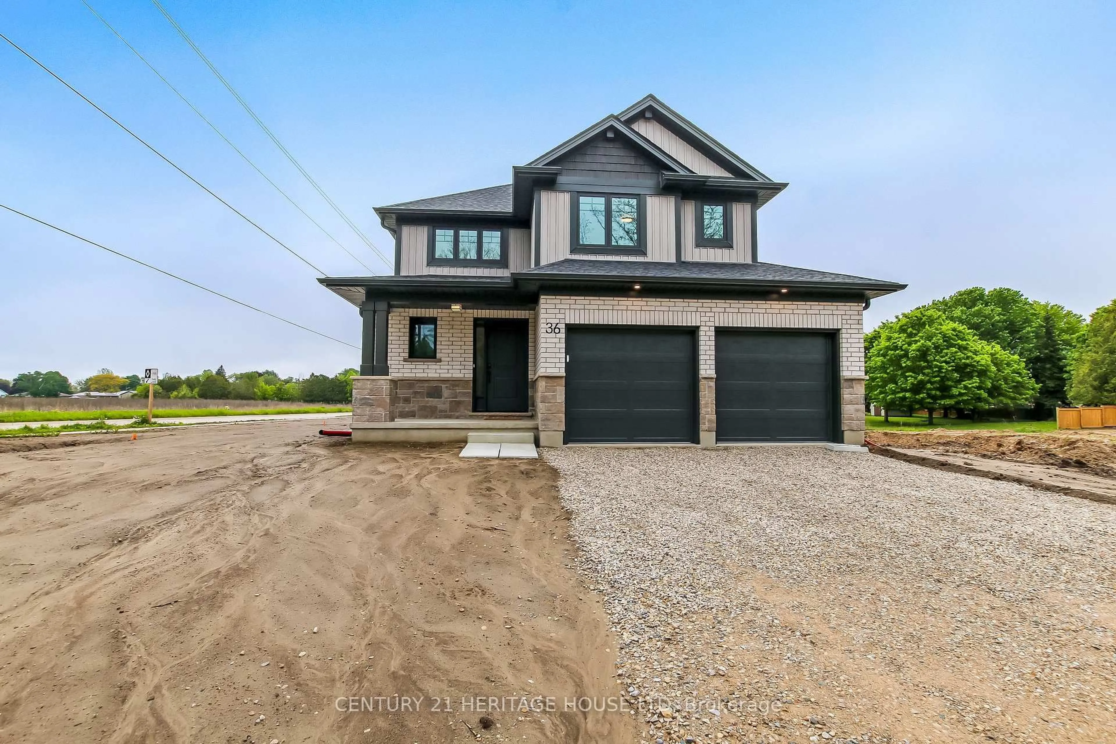 Home with brick exterior material, street for 36 Hawks Gate, Central Elgin Ontario N5R 0R2