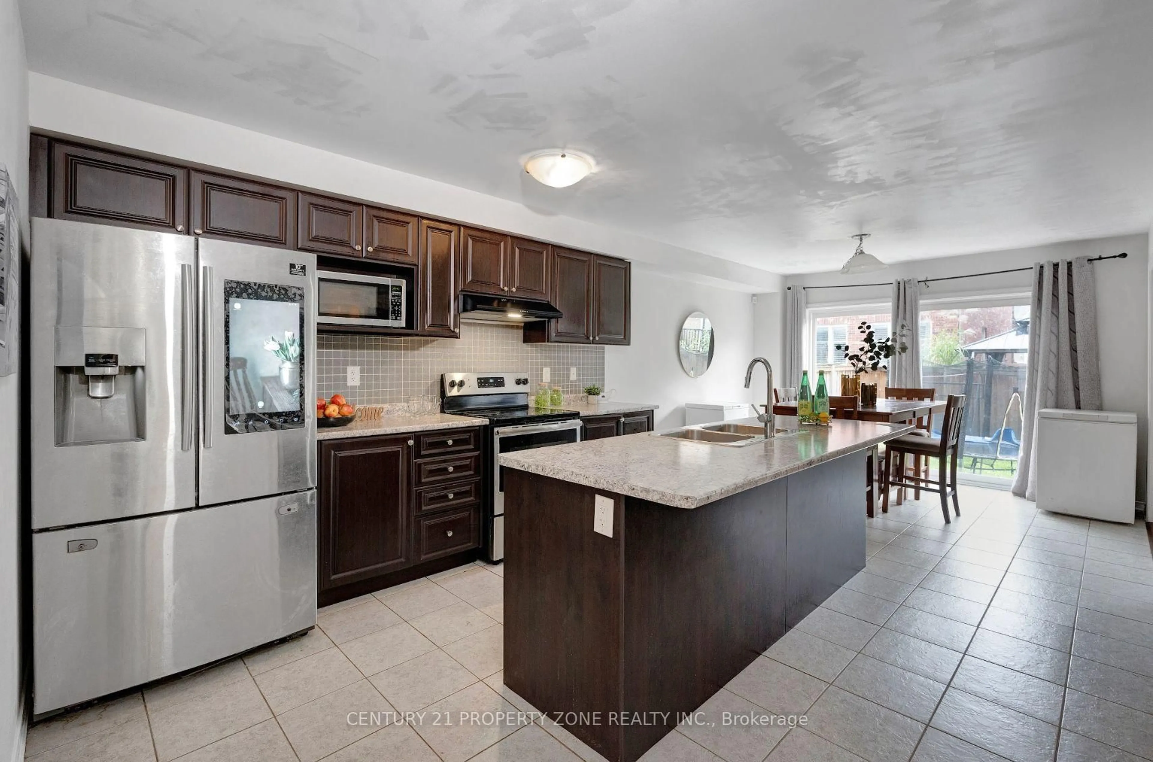 Open concept kitchen, ceramic/tile floor for 43 Mccargow Dr, Haldimand Ontario N3W 0C3