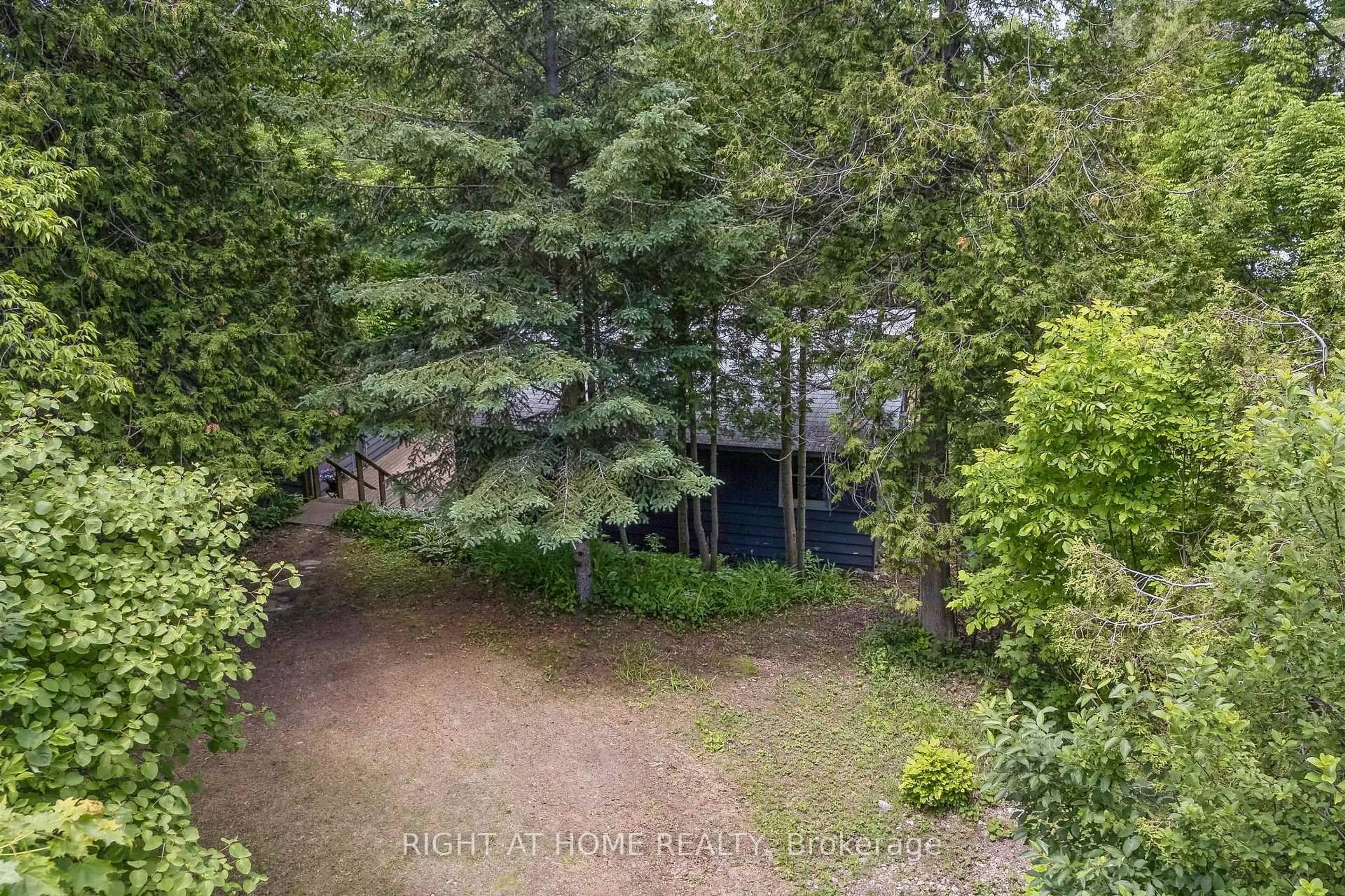A pic from outside/outdoor area/front of a property/back of a property/a pic from drone, forest/trees view for 264 Blanchfield Rd, Saugeen Shores Ontario N0H 2L0