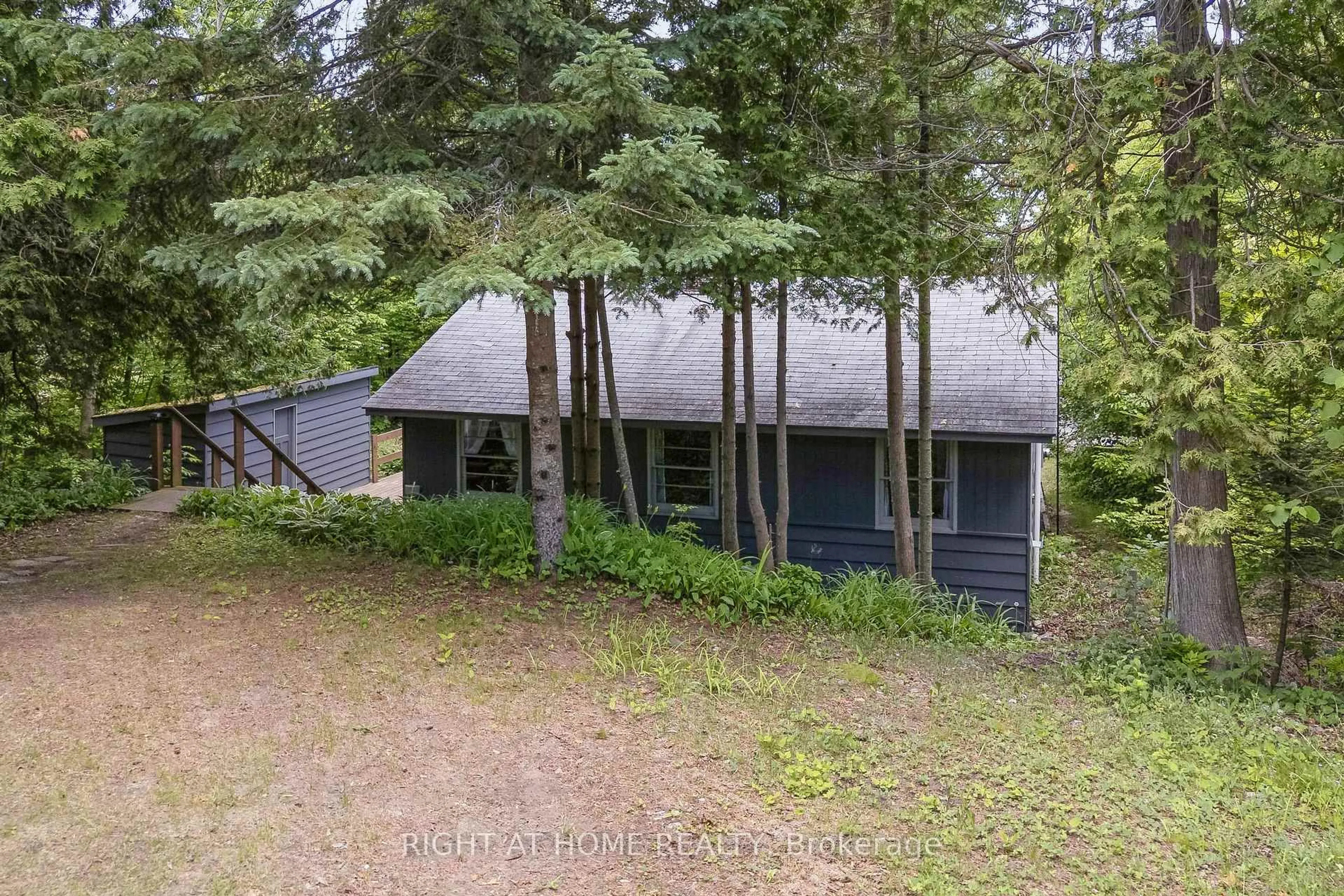 A pic from outside/outdoor area/front of a property/back of a property/a pic from drone, forest/trees view for 264 Blanchfield Rd, Saugeen Shores Ontario N0H 2L0