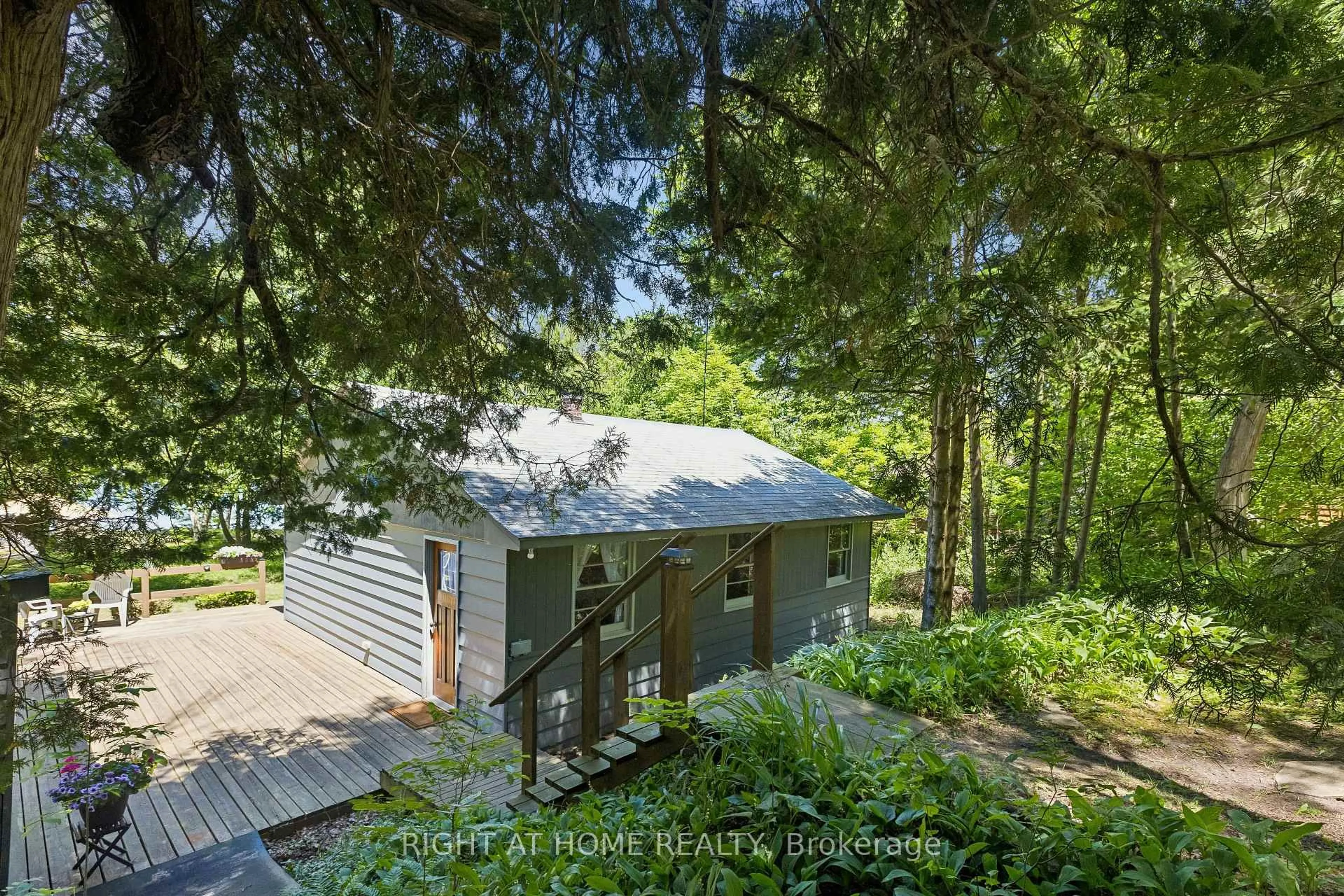 A pic from outside/outdoor area/front of a property/back of a property/a pic from drone, forest/trees view for 264 Blanchfield Rd, Saugeen Shores Ontario N0H 2L0
