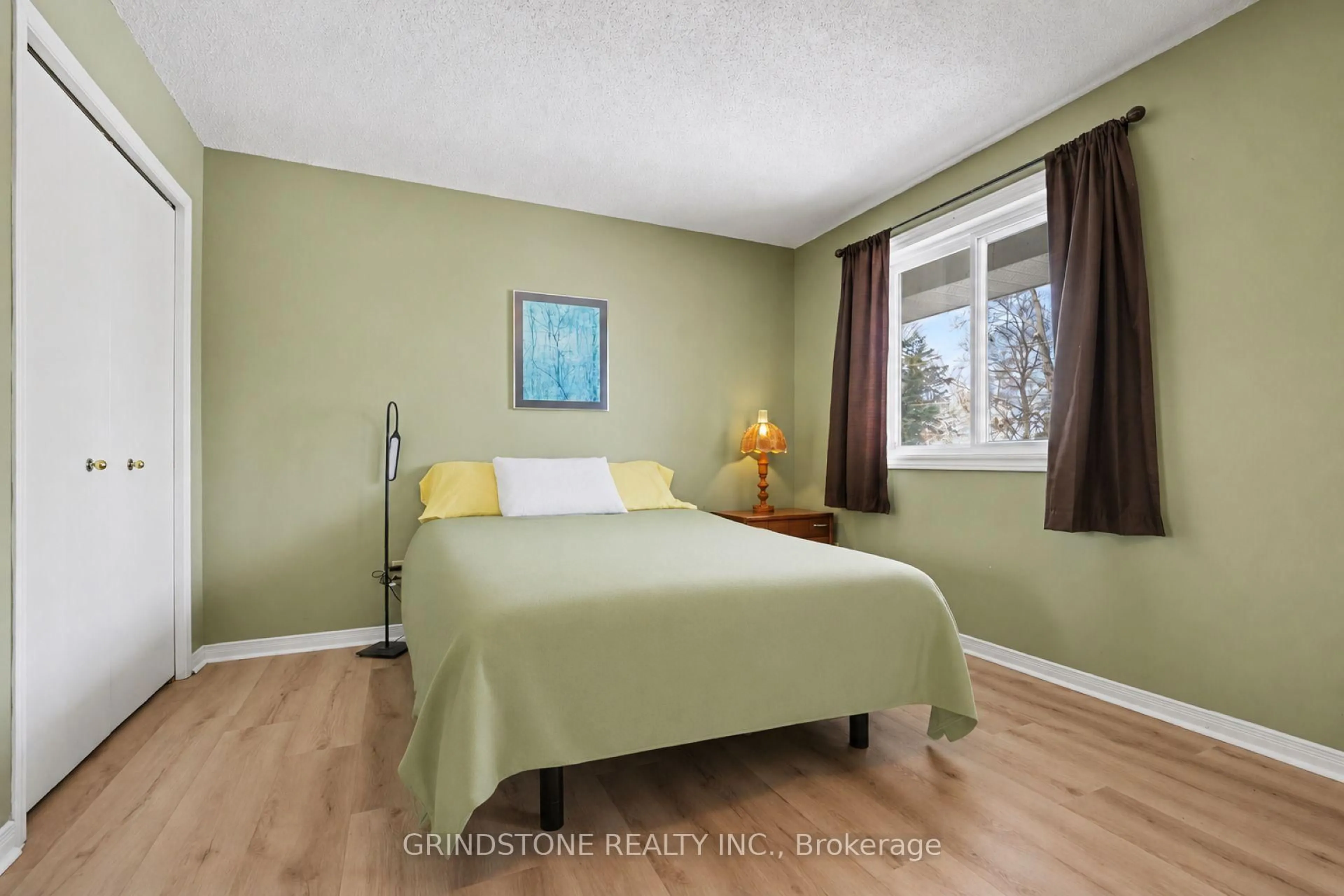 Bedroom with bed, wood/laminate floor for 319 Riverwood Dr, Ottawa Ontario K0A 3M0