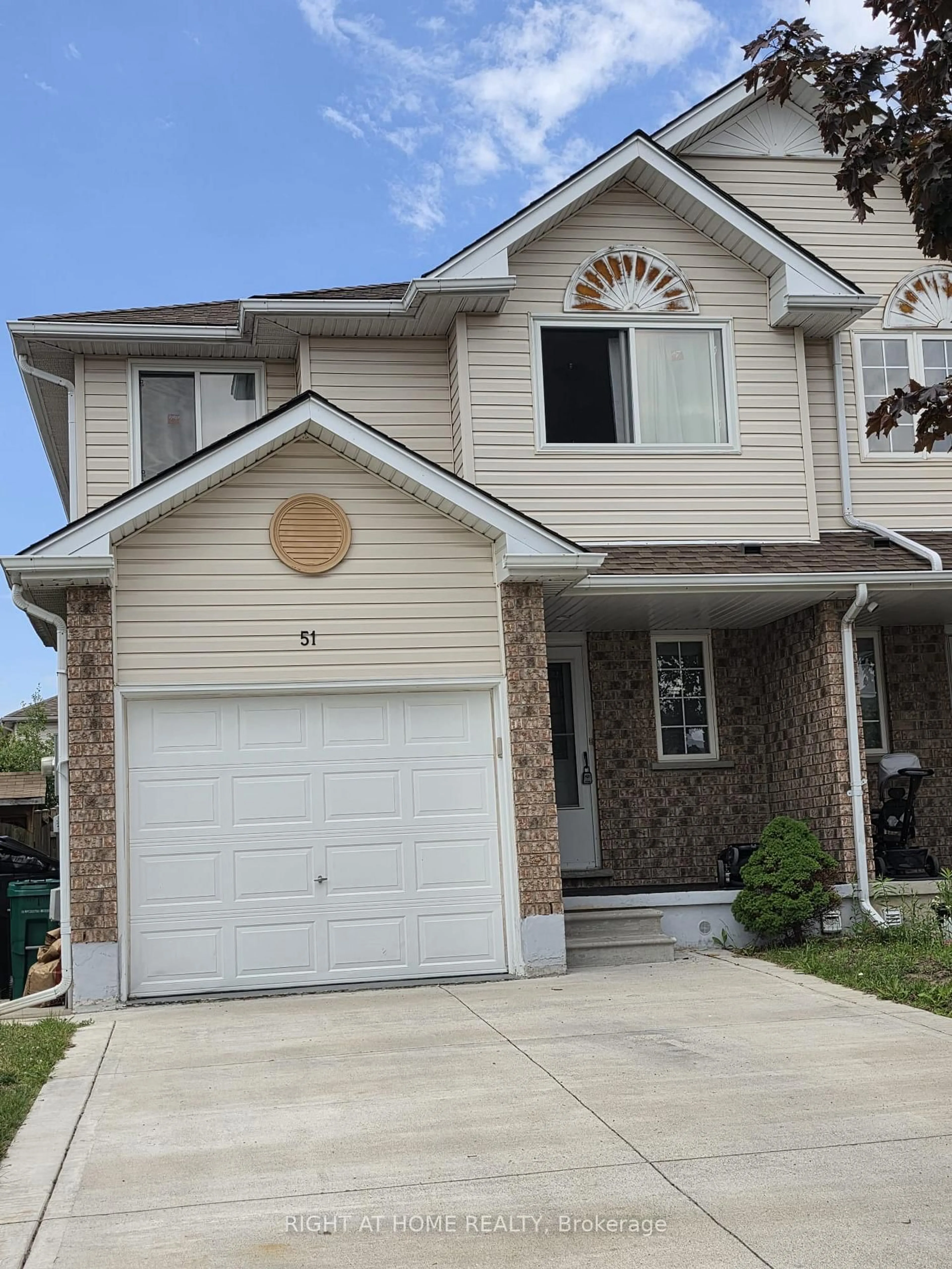 Home with vinyl exterior material, street for 51 Hawkins Dr, Cambridge Ontario N1T 1Z7