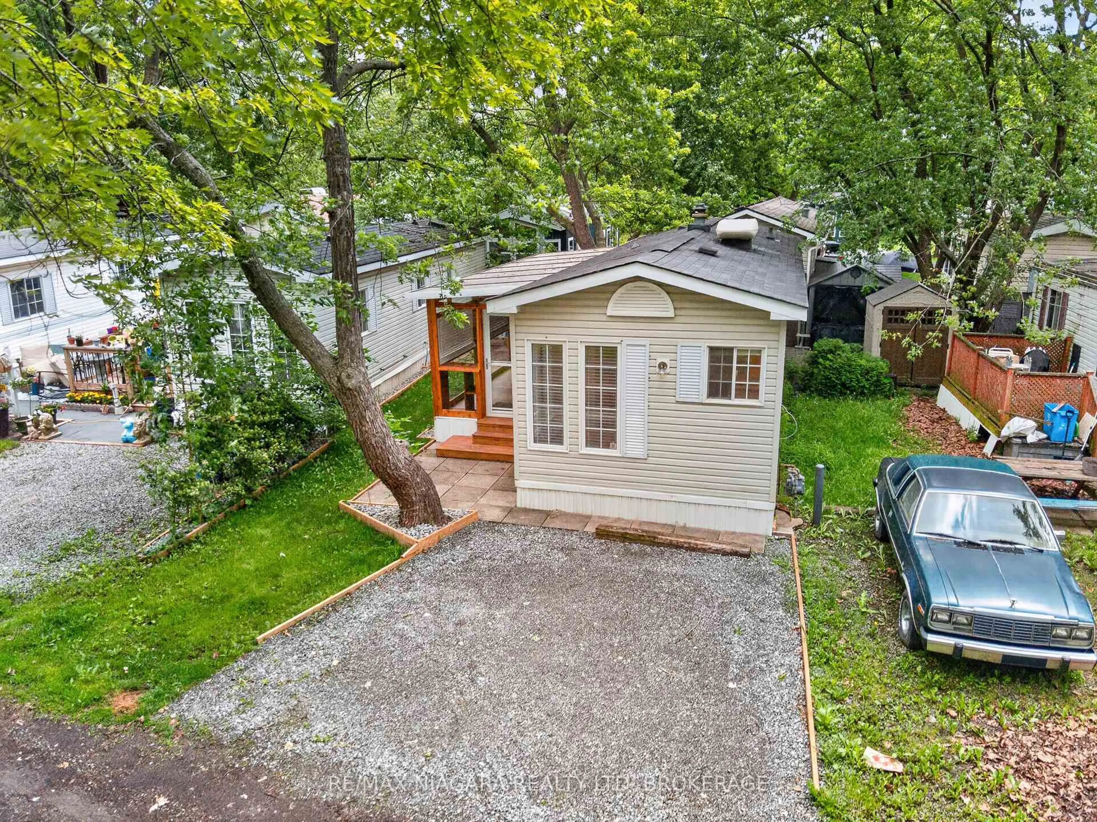 A pic from outside/outdoor area/front of a property/back of a property/a pic from drone, street for 8845 Lundys Lane #234, Niagara Falls Ontario L2H 1H5