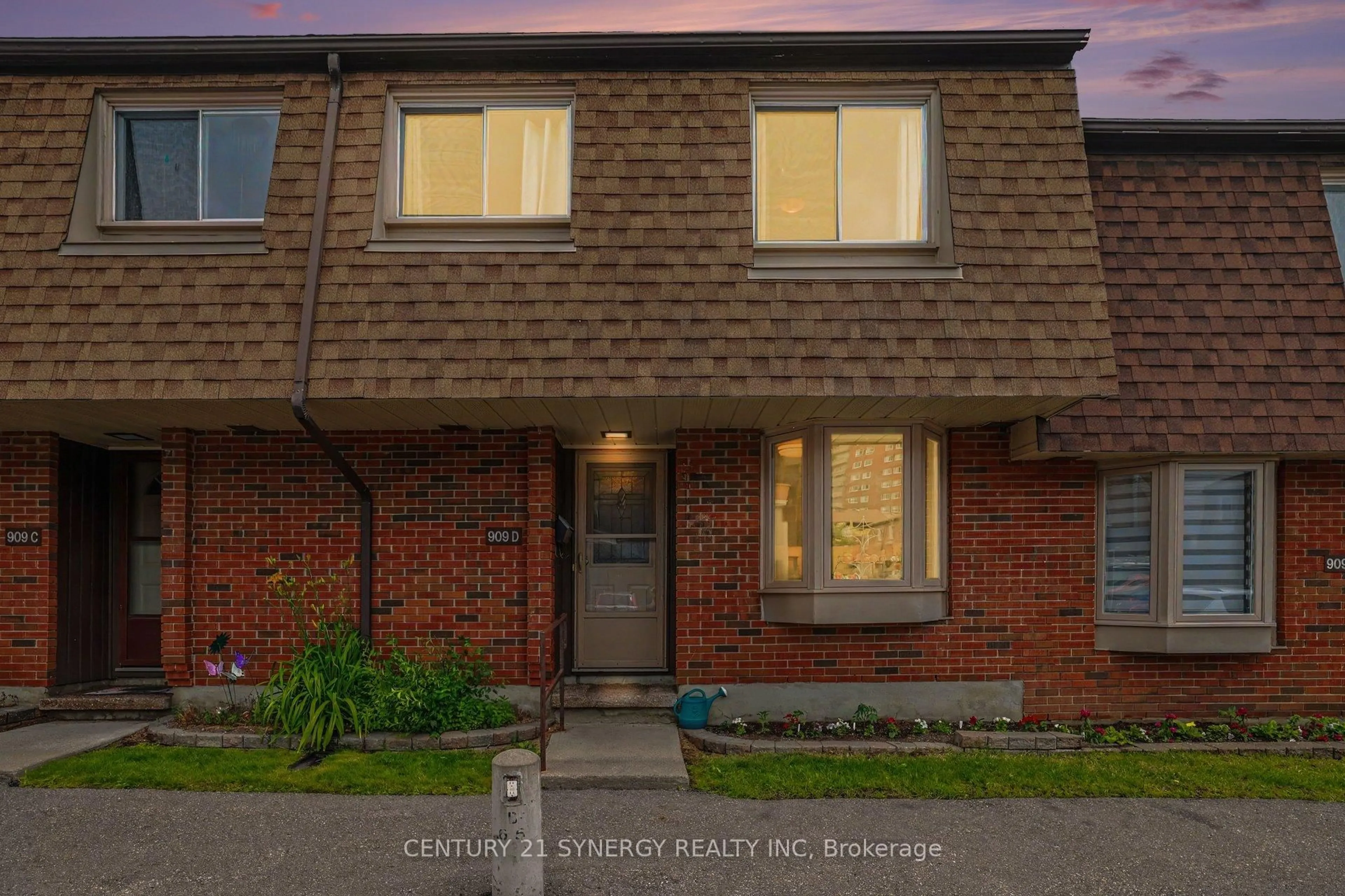 Home with brick exterior material, street for 909D Elmsmere Rd #152, Ottawa Ontario K1J 8G4