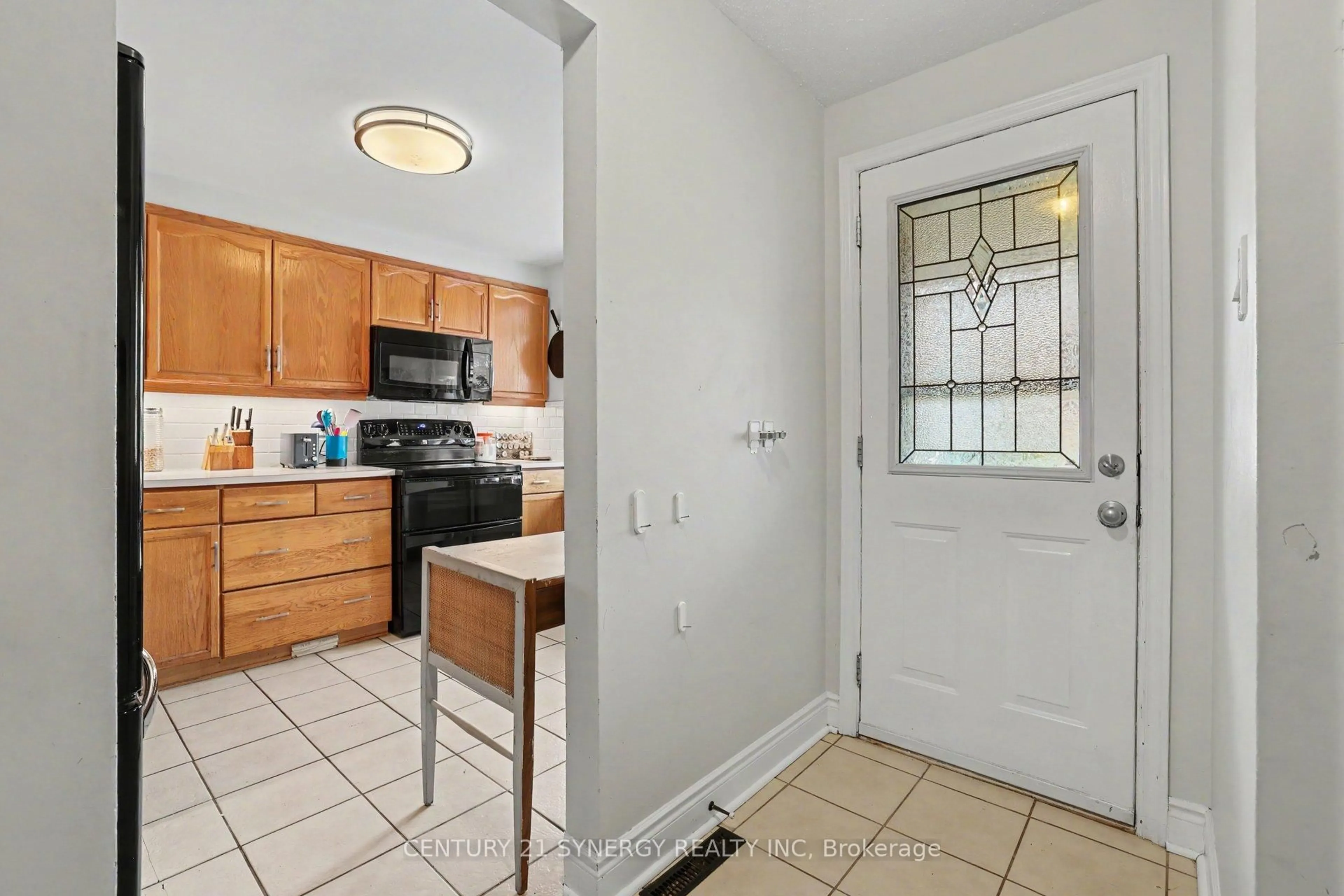 Standard kitchen, ceramic/tile floor for 909D Elmsmere Rd #152, Ottawa Ontario K1J 8G4