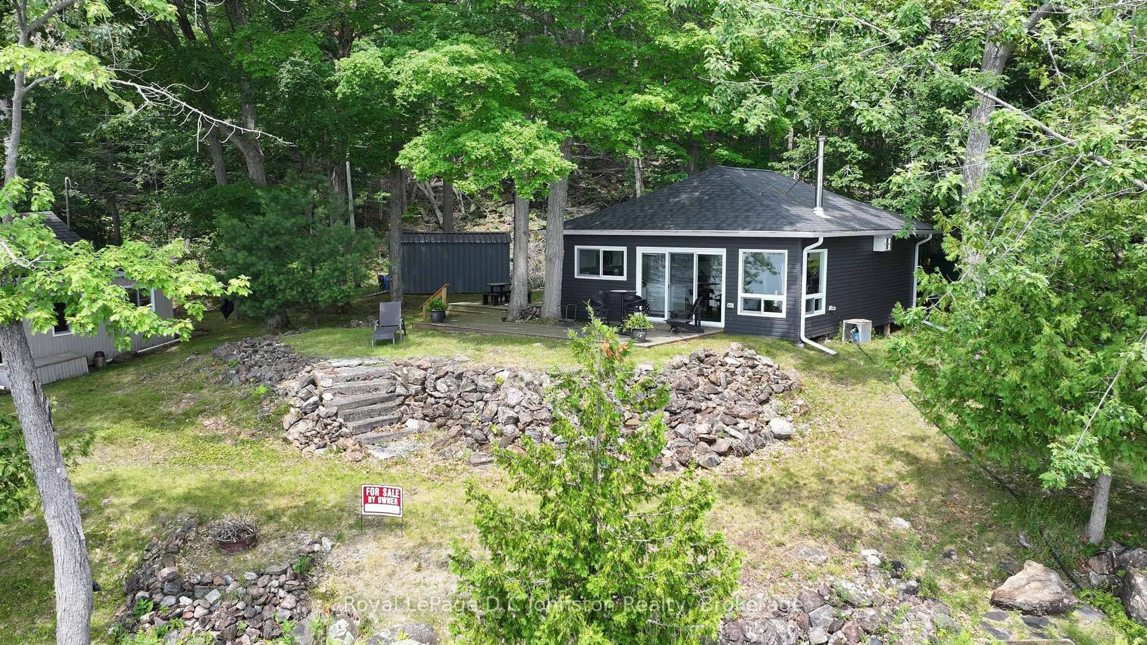 A pic from outside/outdoor area/front of a property/back of a property/a pic from drone, water/lake/river/ocean view for 247 Big Island Bel Lk, Havelock-Belmont-Methuen Ontario K0L 1Z0