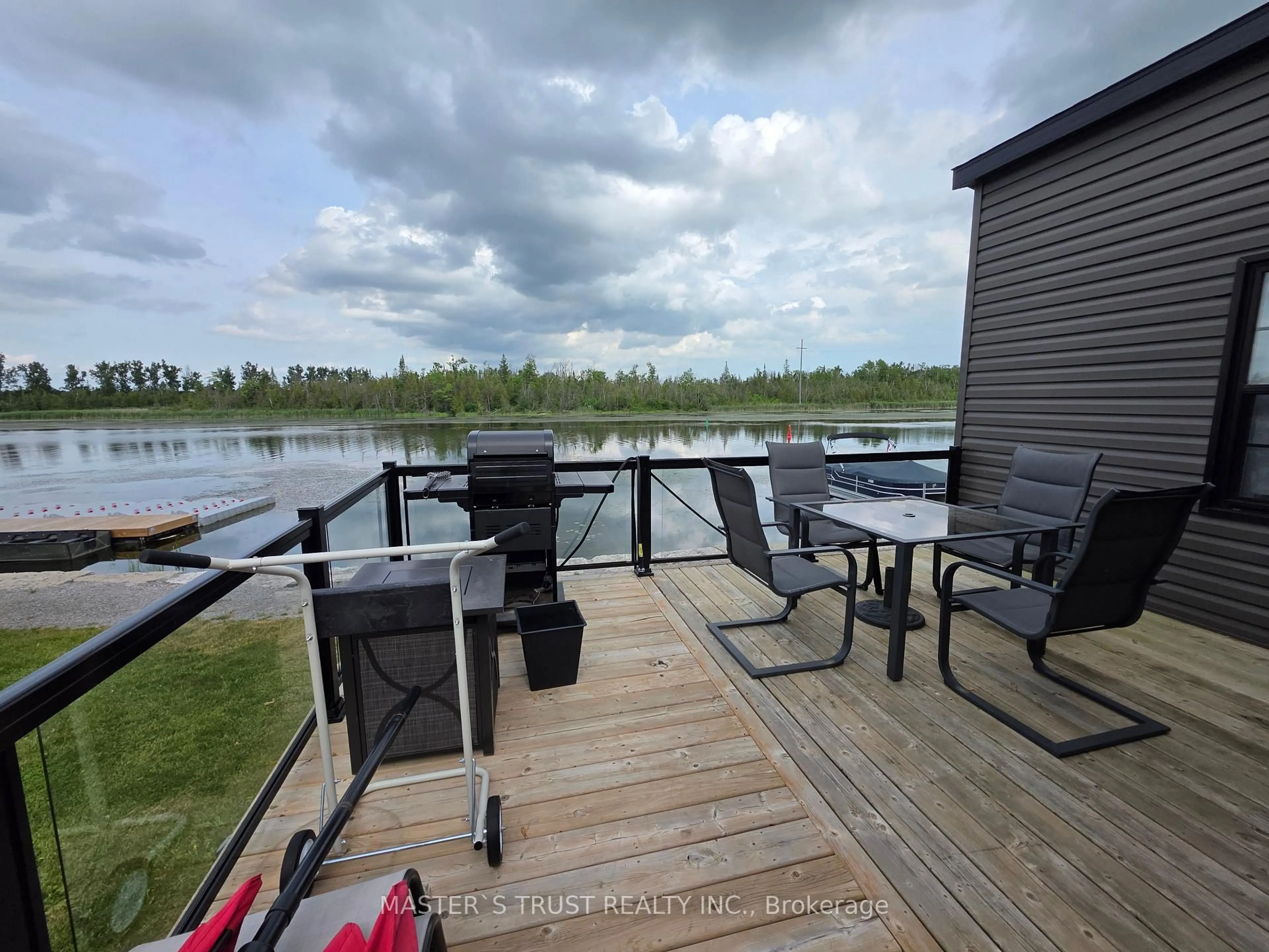 Patio, water/lake/river/ocean view for 657 Thunder Bridge Rd #W5, Kawartha Lakes Ontario K9V 4R1