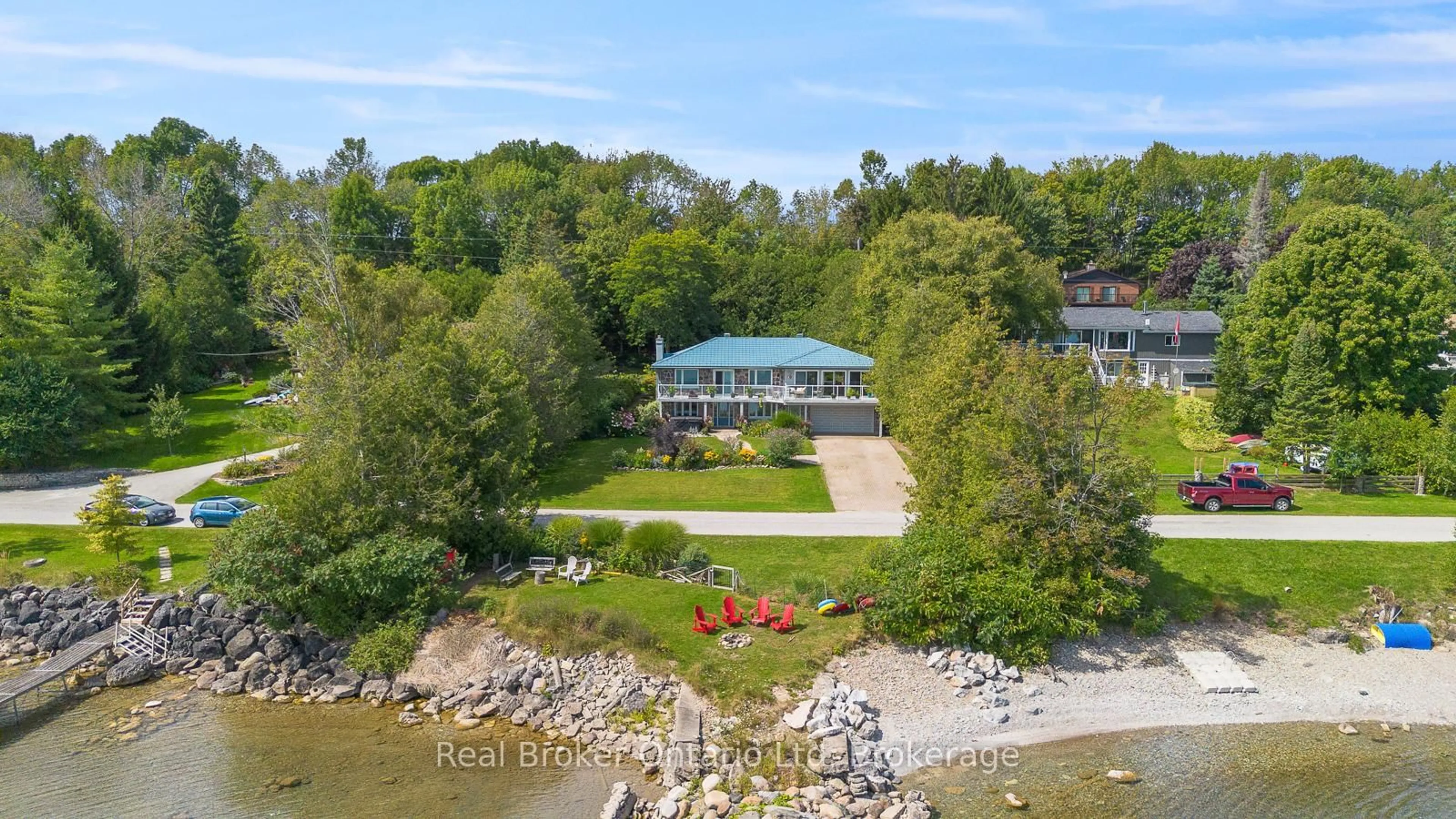 A pic from outside/outdoor area/front of a property/back of a property/a pic from drone, water/lake/river/ocean view for 339496 Presquile Rd, Georgian Bluffs Ontario N0H 2T0