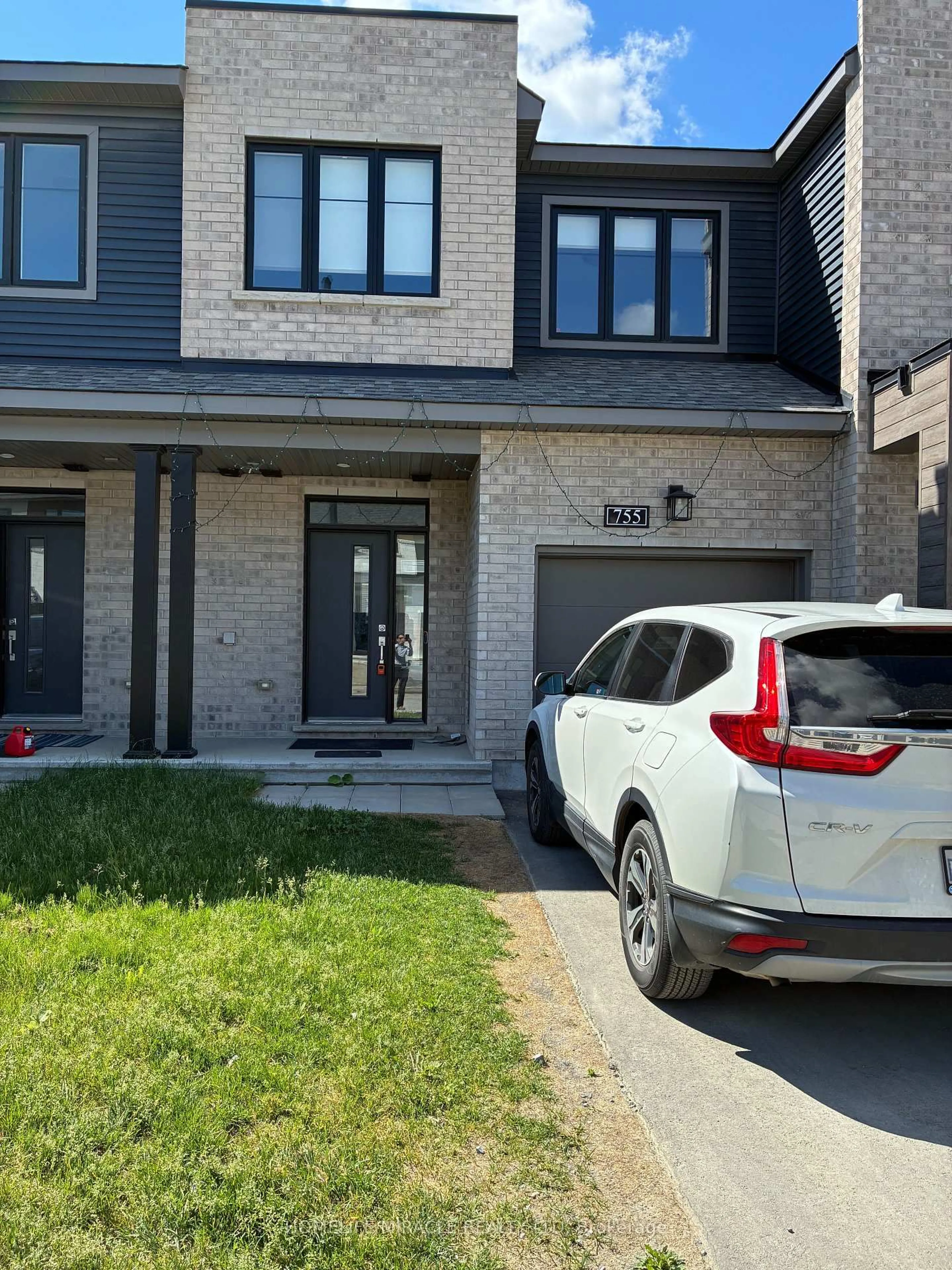 Home with brick exterior material, street for 755 Fairline Row, Ottawa Ontario K2V 0M4