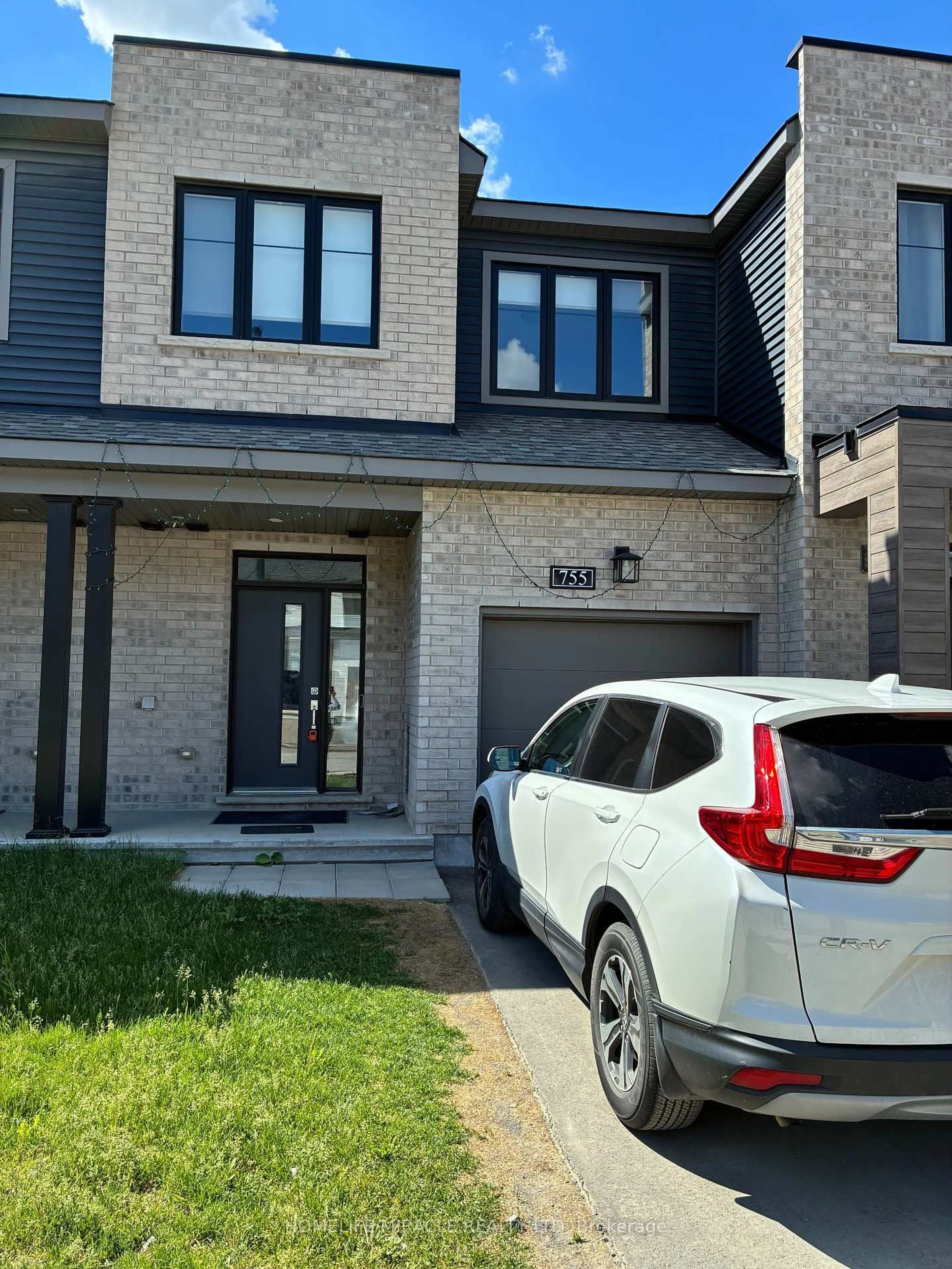 Home with brick exterior material, street for 755 Fairline Row, Ottawa Ontario K2V 0M4