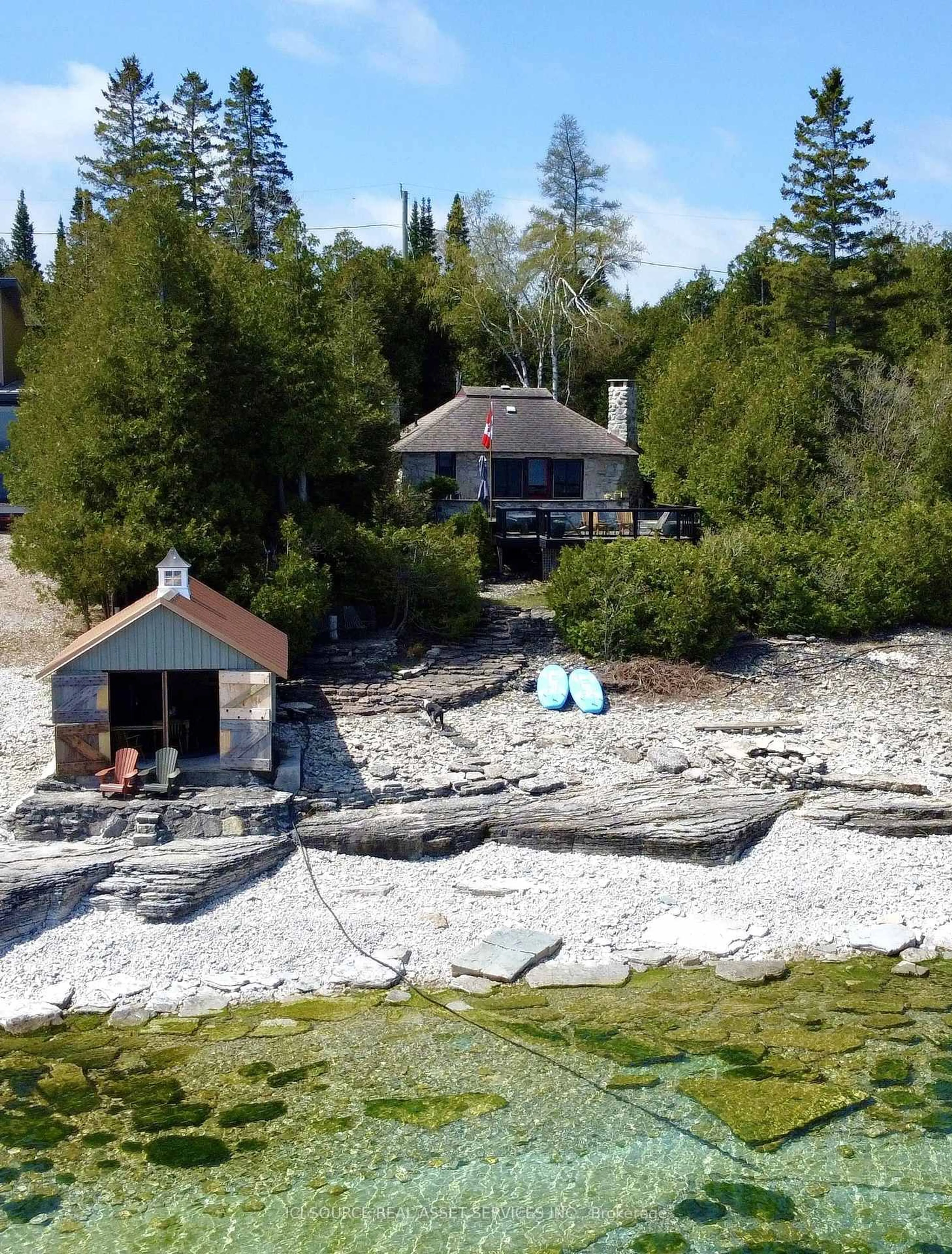 A pic from outside/outdoor area/front of a property/back of a property/a pic from drone, water/lake/river/ocean view for 60 Isthmus Bay Rd, Northern Bruce Peninsula Ontario N0H 1W0