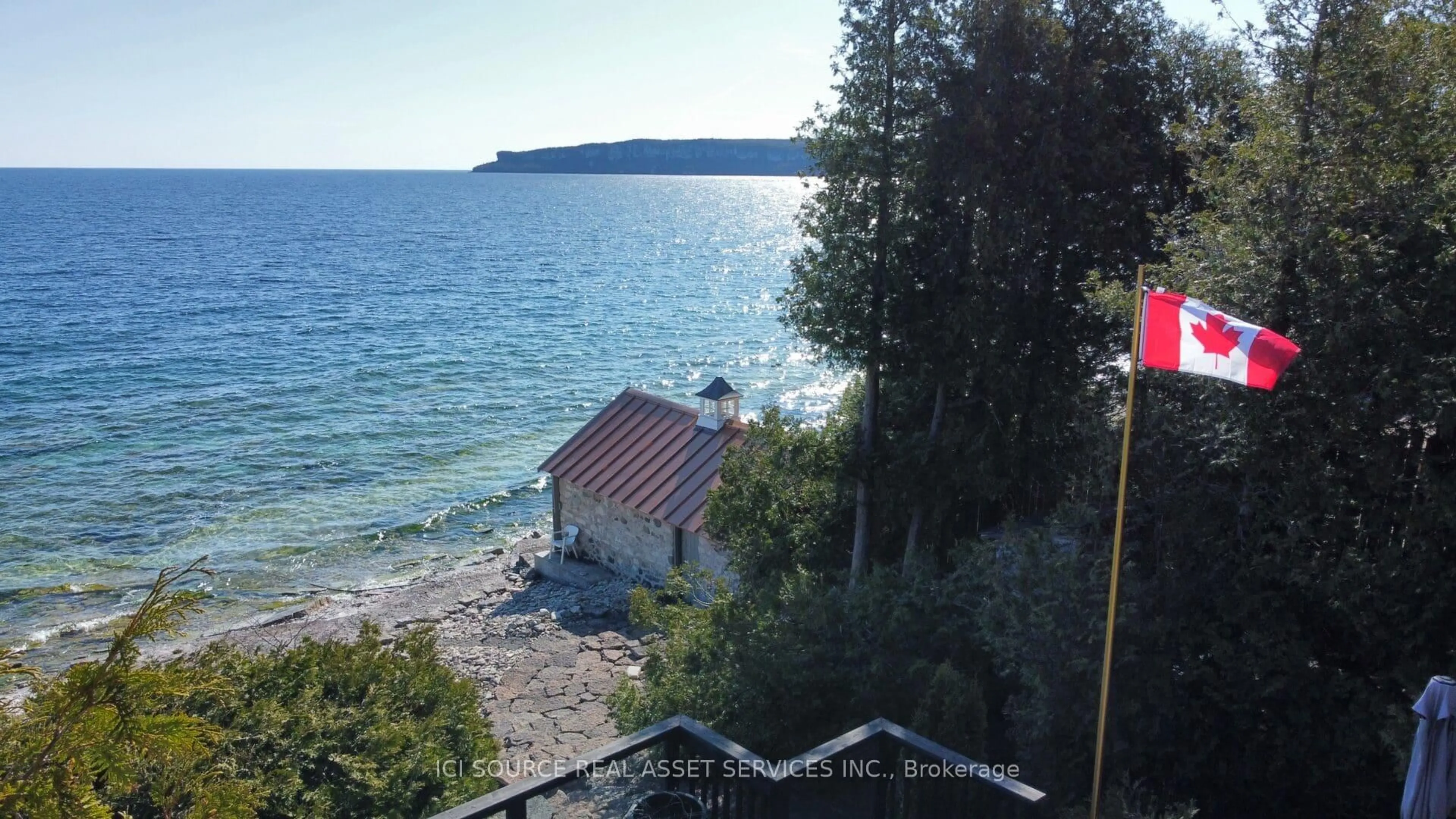 A pic from outside/outdoor area/front of a property/back of a property/a pic from drone, water/lake/river/ocean view for 60 Isthmus Bay Rd, Northern Bruce Peninsula Ontario N0H 1W0