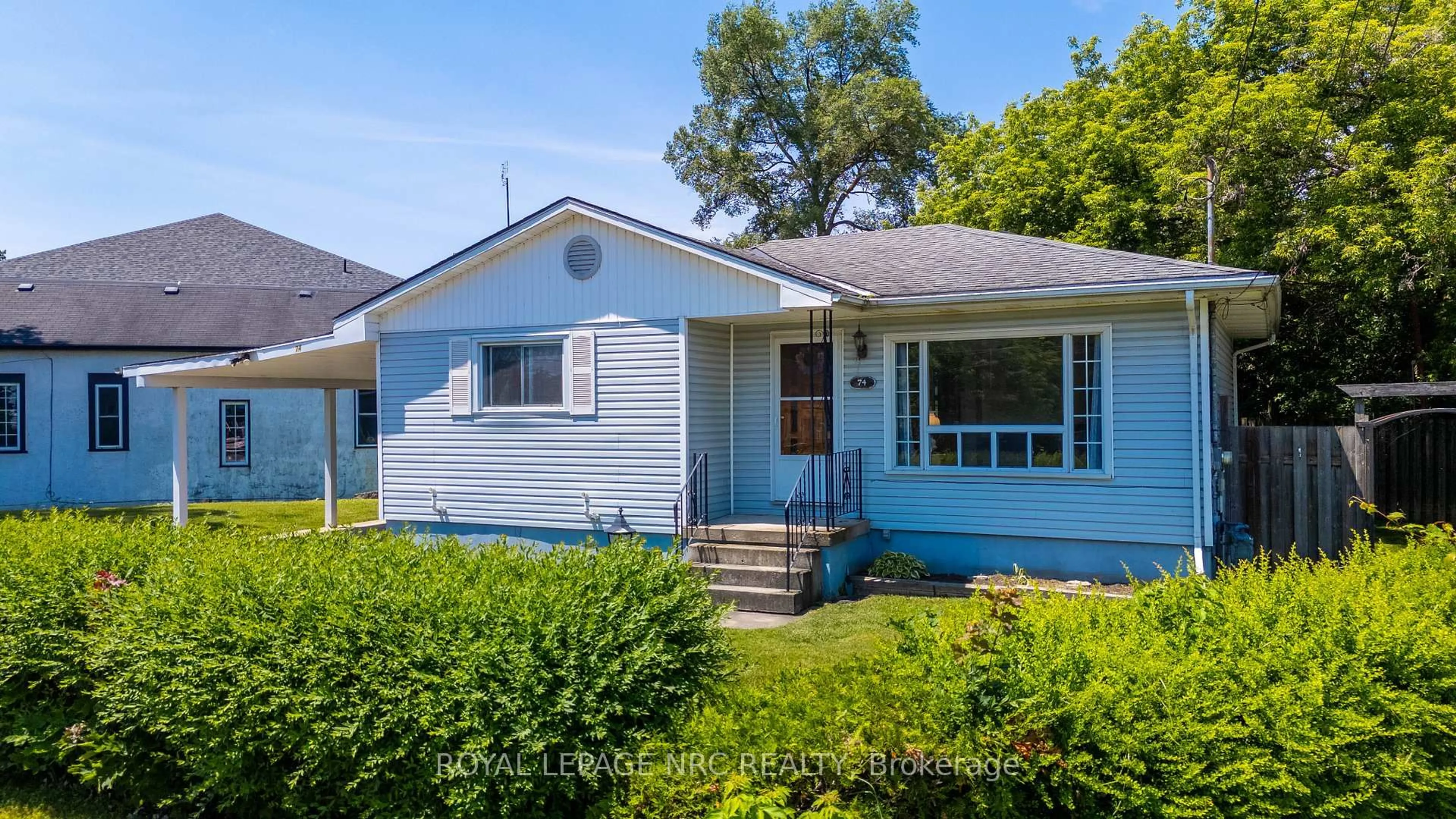 Home with vinyl exterior material, street for 74 Dolphin St, Port Colborne Ontario L3K 2J2