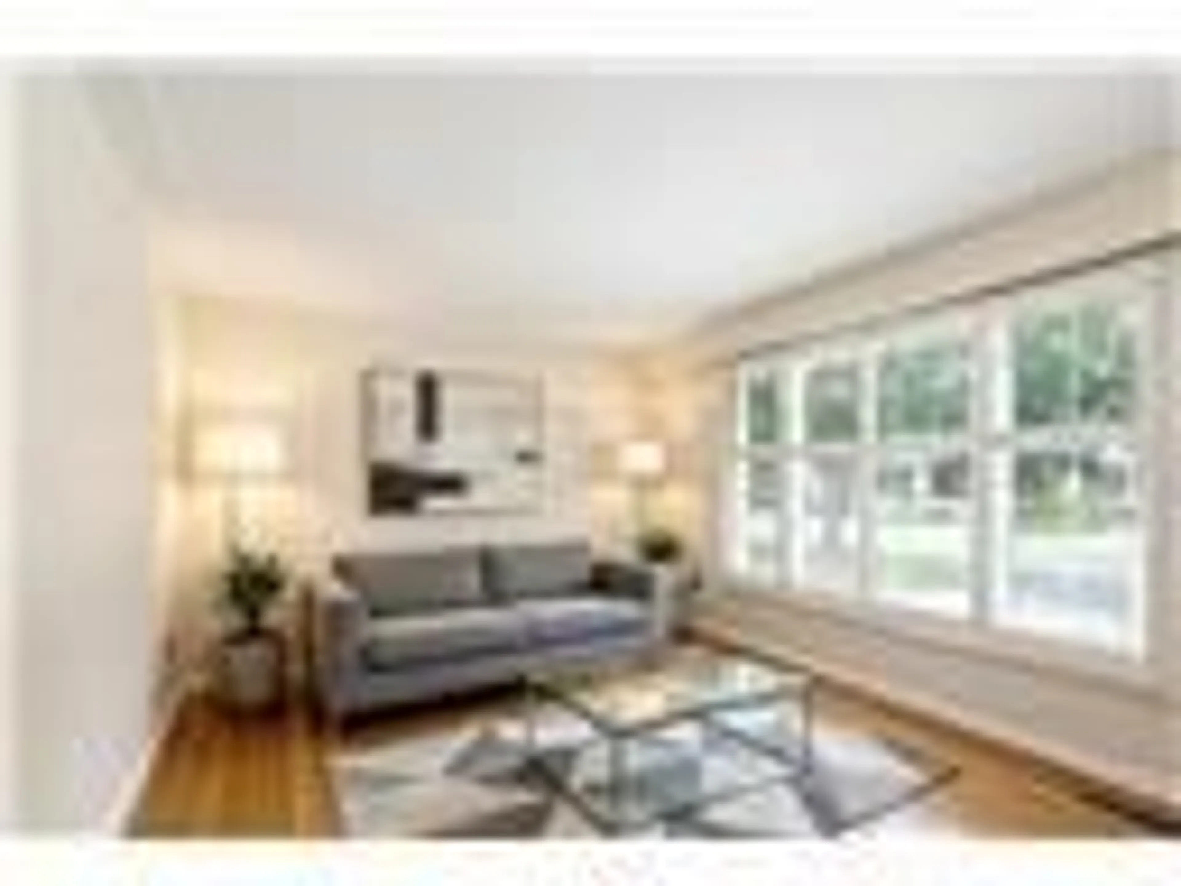 Living room with furniture, wood/laminate floor for 31 Sycamore St, Hamilton Ontario L8T 3N6