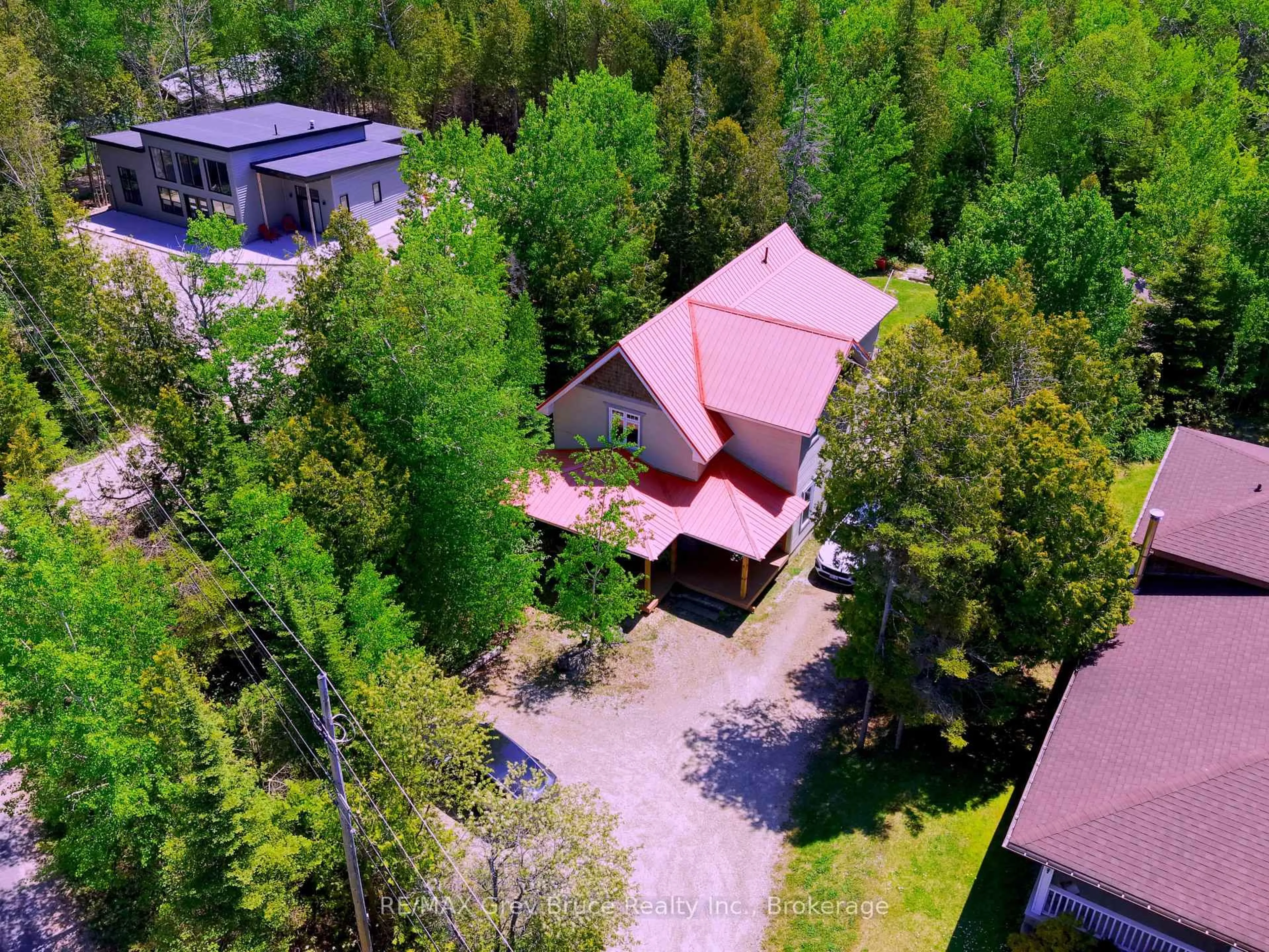 A pic from outside/outdoor area/front of a property/back of a property/a pic from drone, forest/trees view for 67 Big Tub Rd, Northern Bruce Peninsula Ontario N0H 2R0