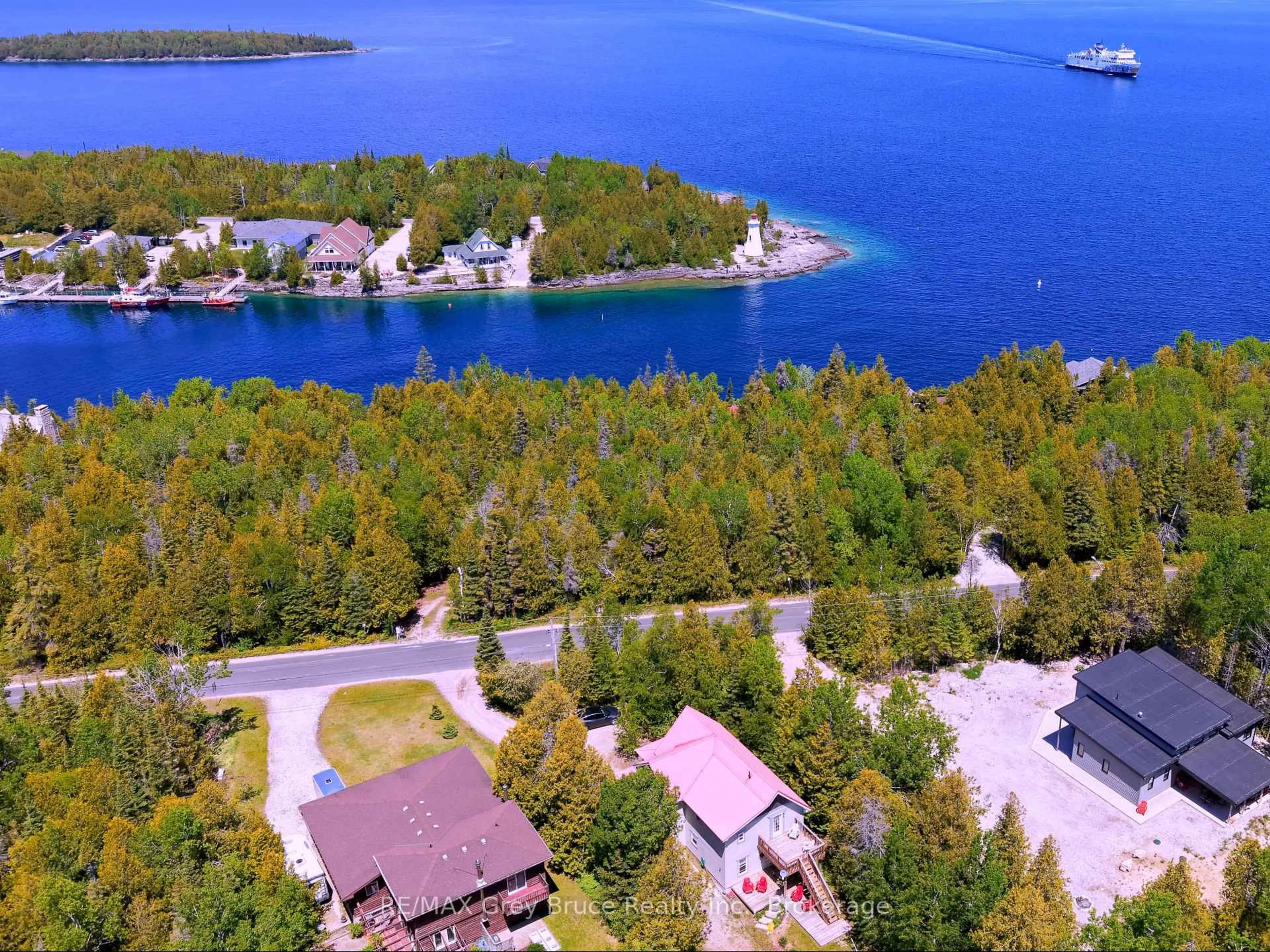 A pic from outside/outdoor area/front of a property/back of a property/a pic from drone, water/lake/river/ocean view for 67 Big Tub Rd, Northern Bruce Peninsula Ontario N0H 2R0