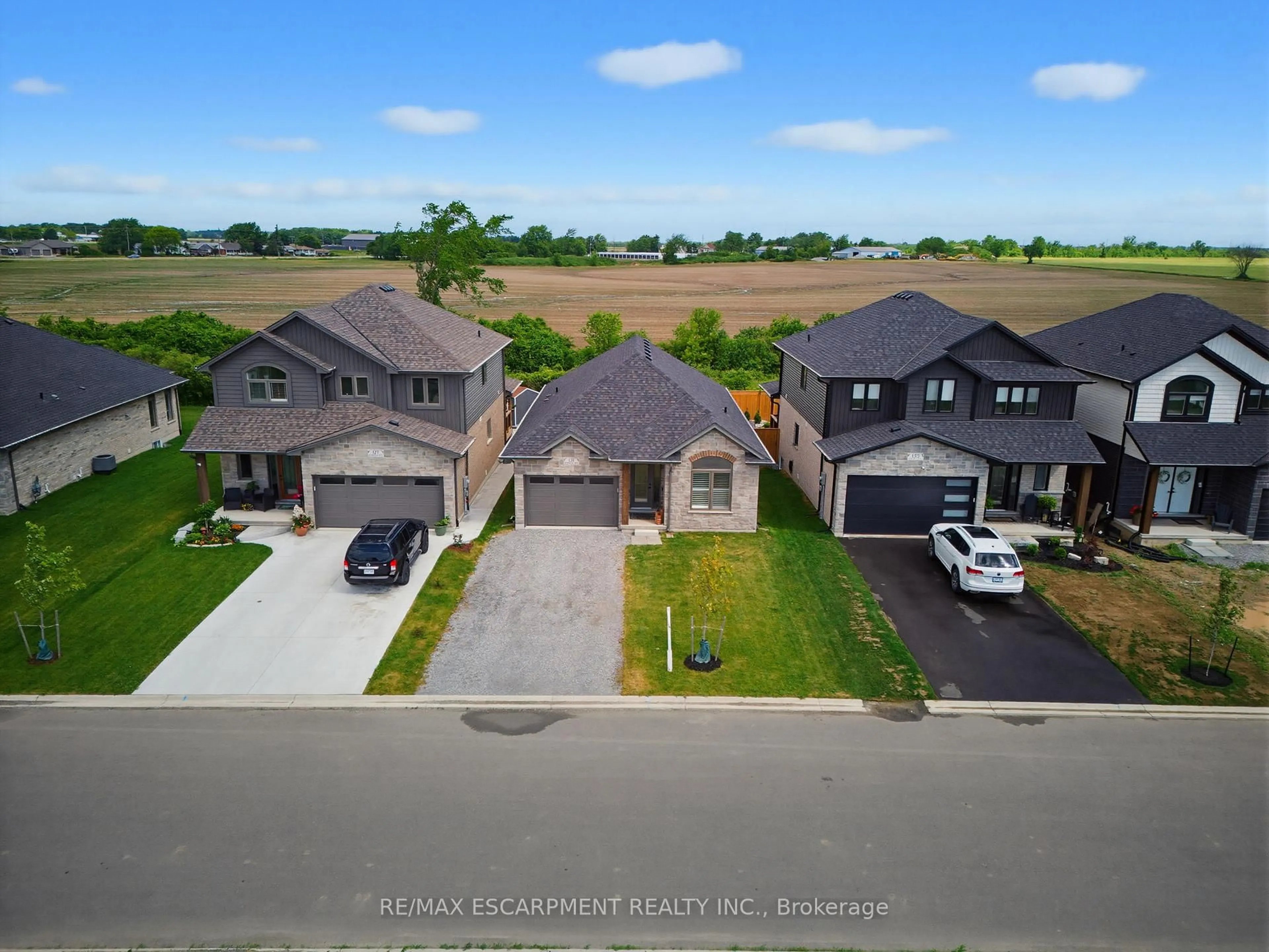 A pic from outside/outdoor area/front of a property/back of a property/a pic from drone, street for 131 Craddock Blvd, Haldimand Ontario N0A 1J0
