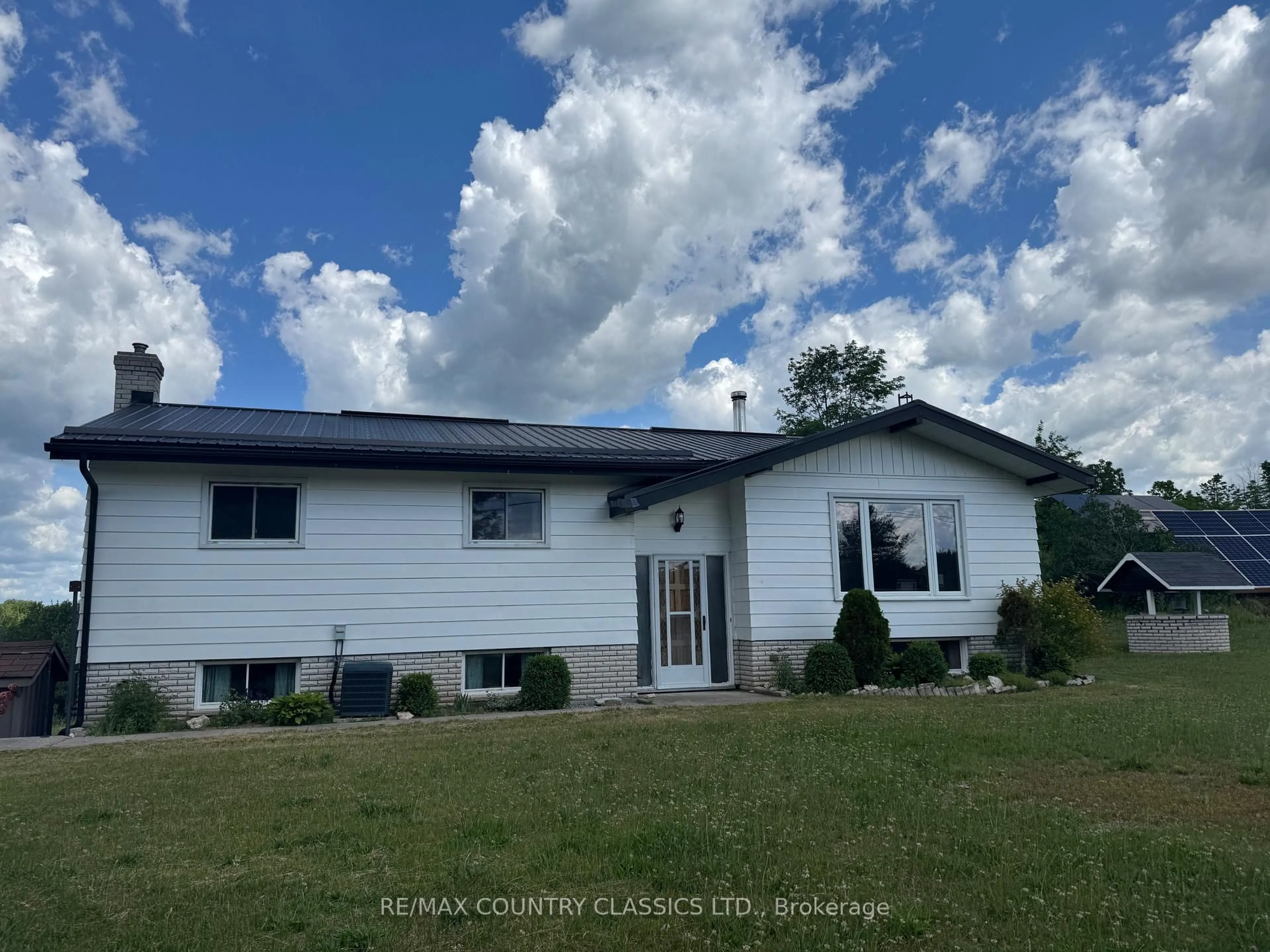 A pic from outside/outdoor area/front of a property/back of a property/a pic from drone, unknown for 18 Soikie Rd, Tweed Ontario K0K 3J0