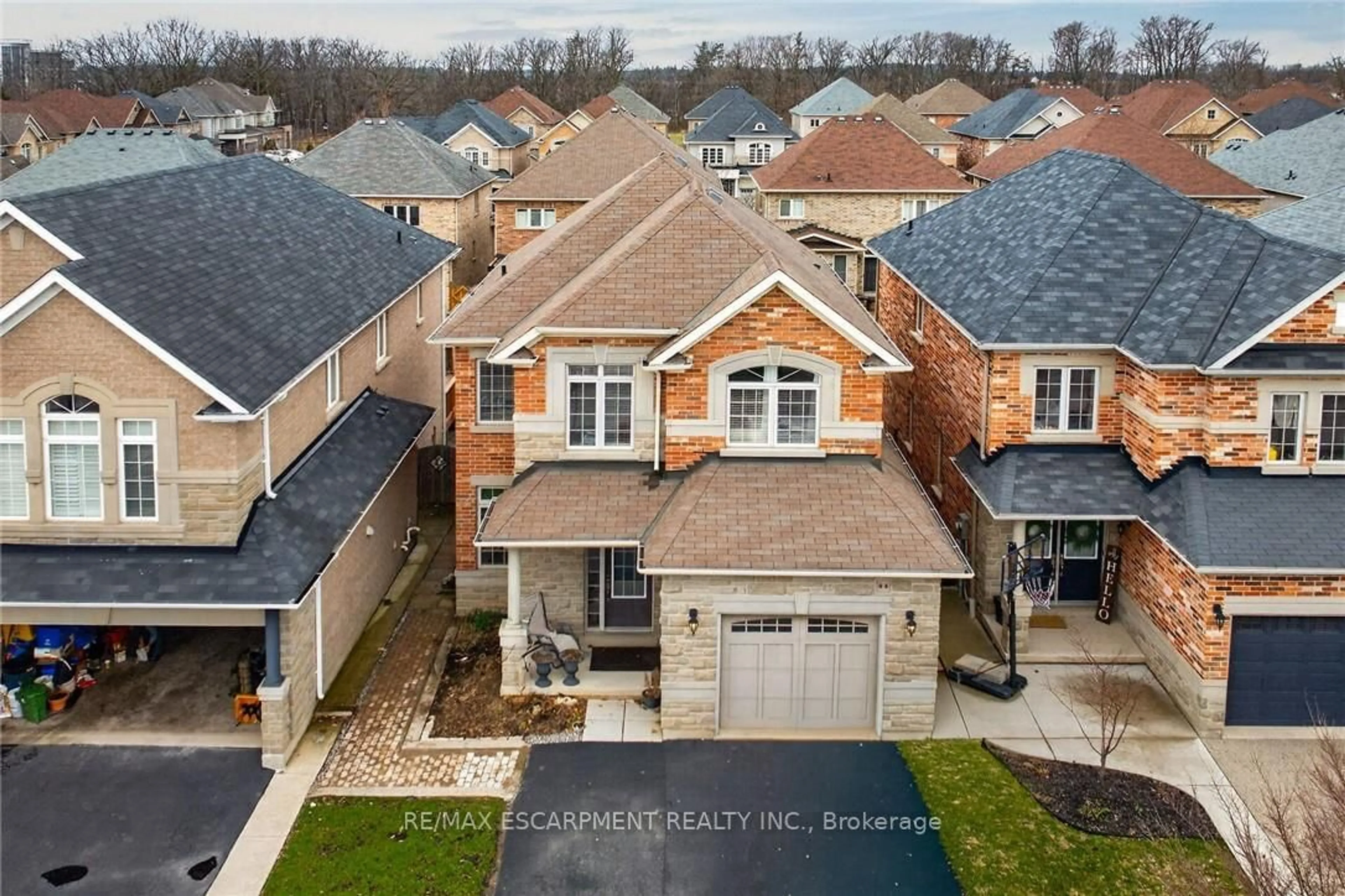 A pic from outside/outdoor area/front of a property/back of a property/a pic from drone, street for 44 Matteo Tr, Hamilton Ontario L9B 0E6