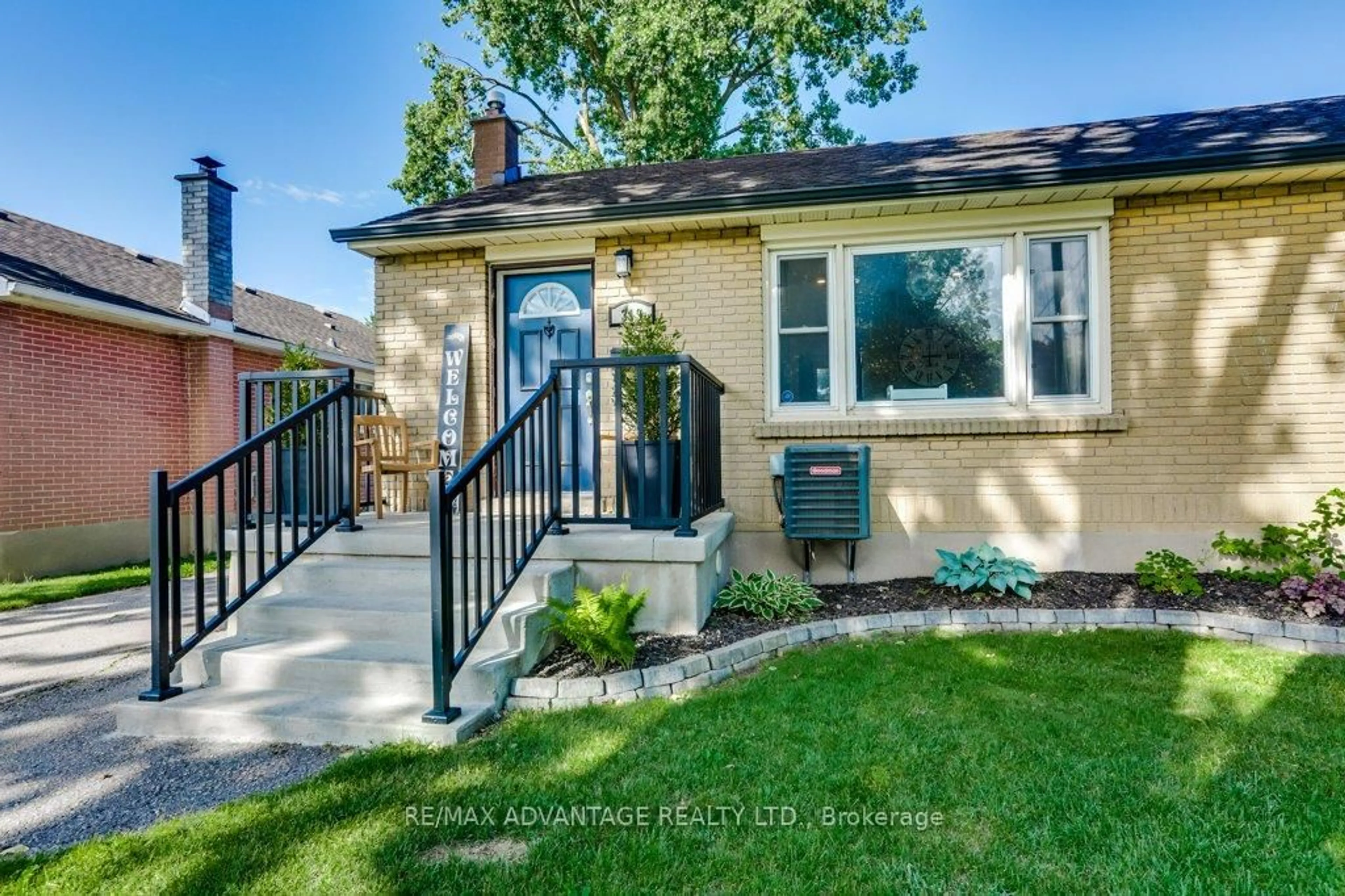 Home with brick exterior material, street for 319 Manitoba St, London East Ontario N5W 4W2