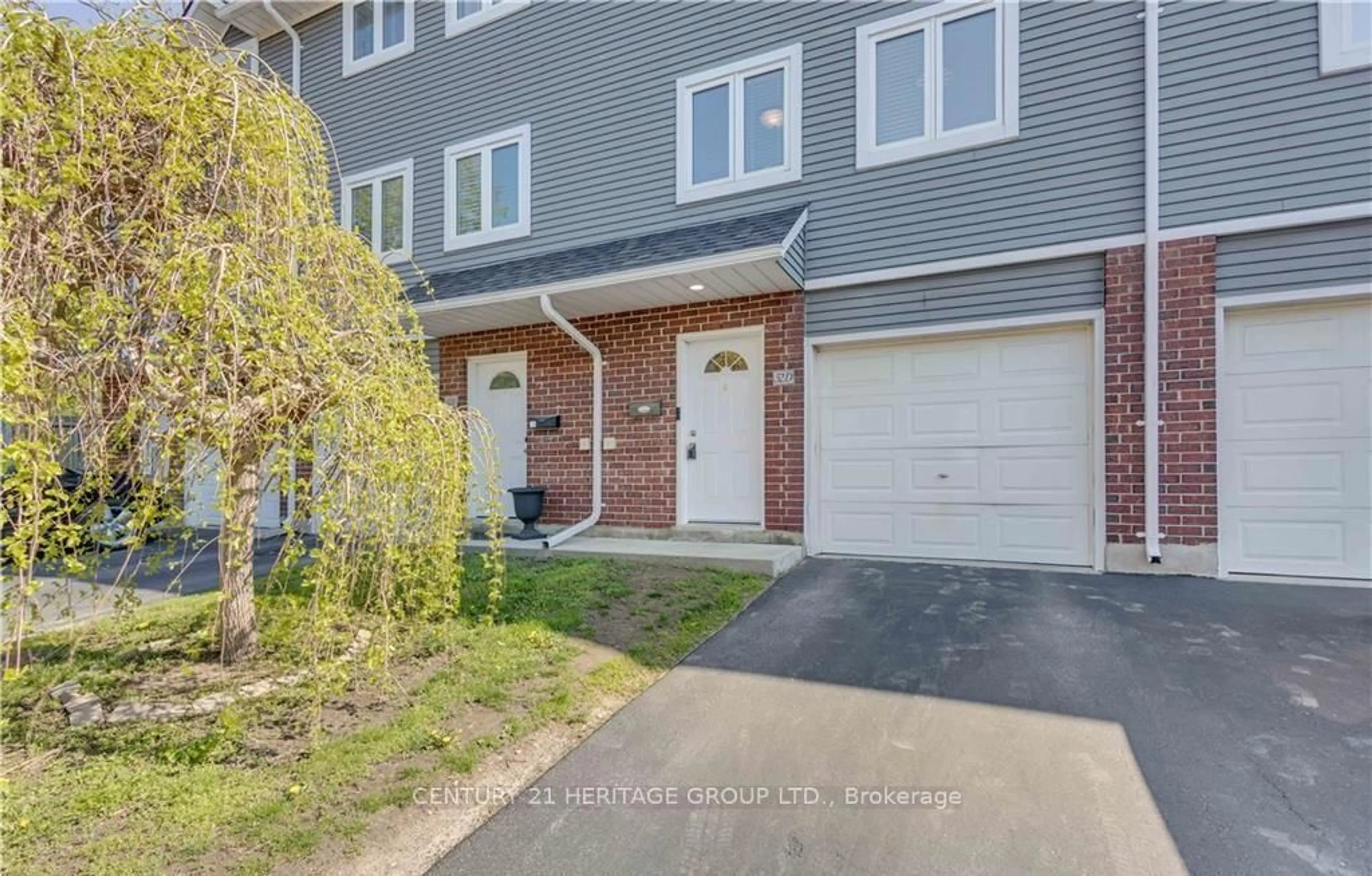 A pic from outside/outdoor area/front of a property/back of a property/a pic from drone, street for 52 Harris Ave #D, Brantford Ontario N3R 2E9