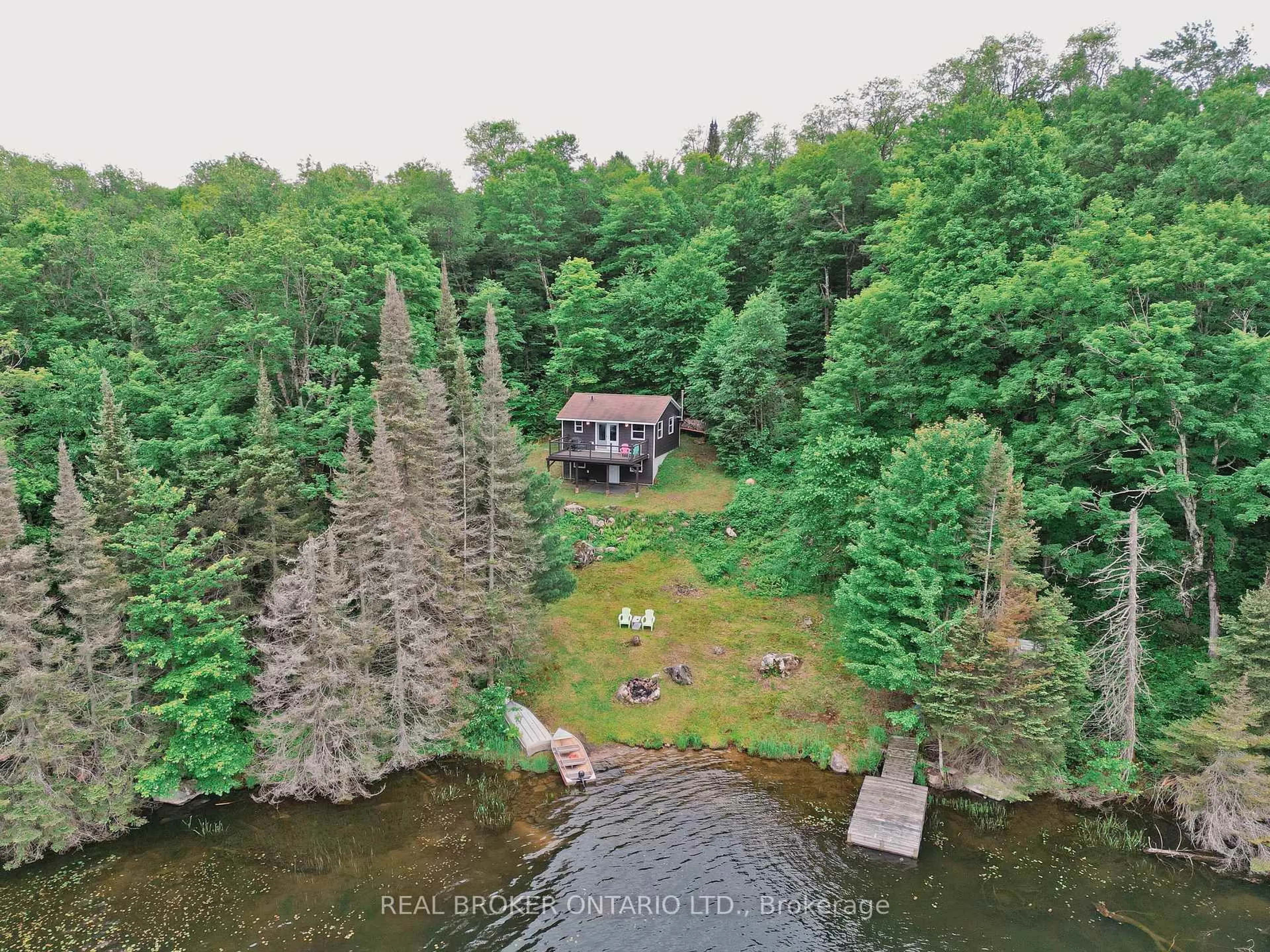 A pic from outside/outdoor area/front of a property/back of a property/a pic from drone, water/lake/river/ocean view for 41 Andy Neville Pkwy, Machar Ontario P0A 1X0