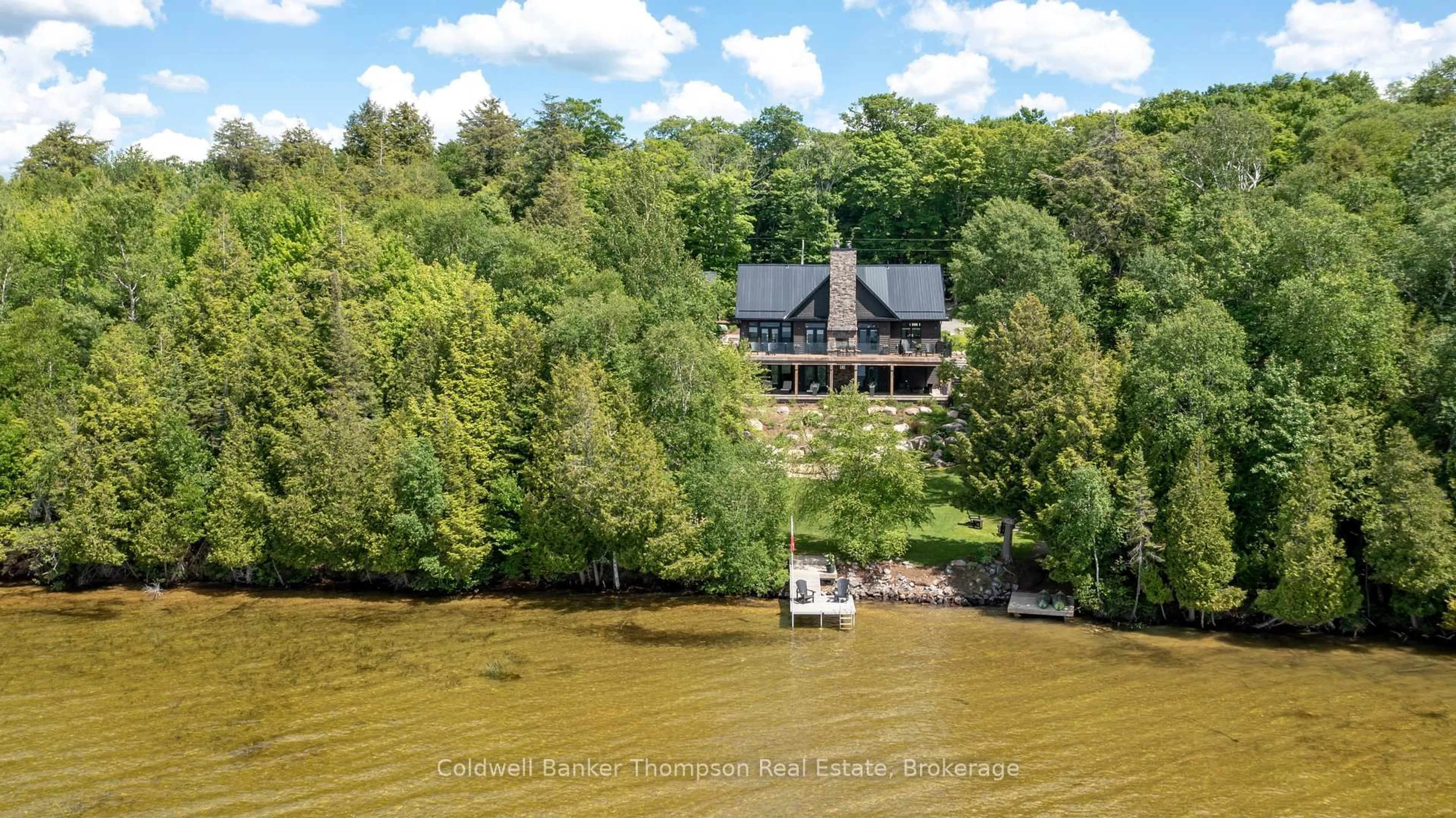 A pic from outside/outdoor area/front of a property/back of a property/a pic from drone, water/lake/river/ocean view for 1126A South Bernard Lake Rd, Strong Ontario P0A 1Z0