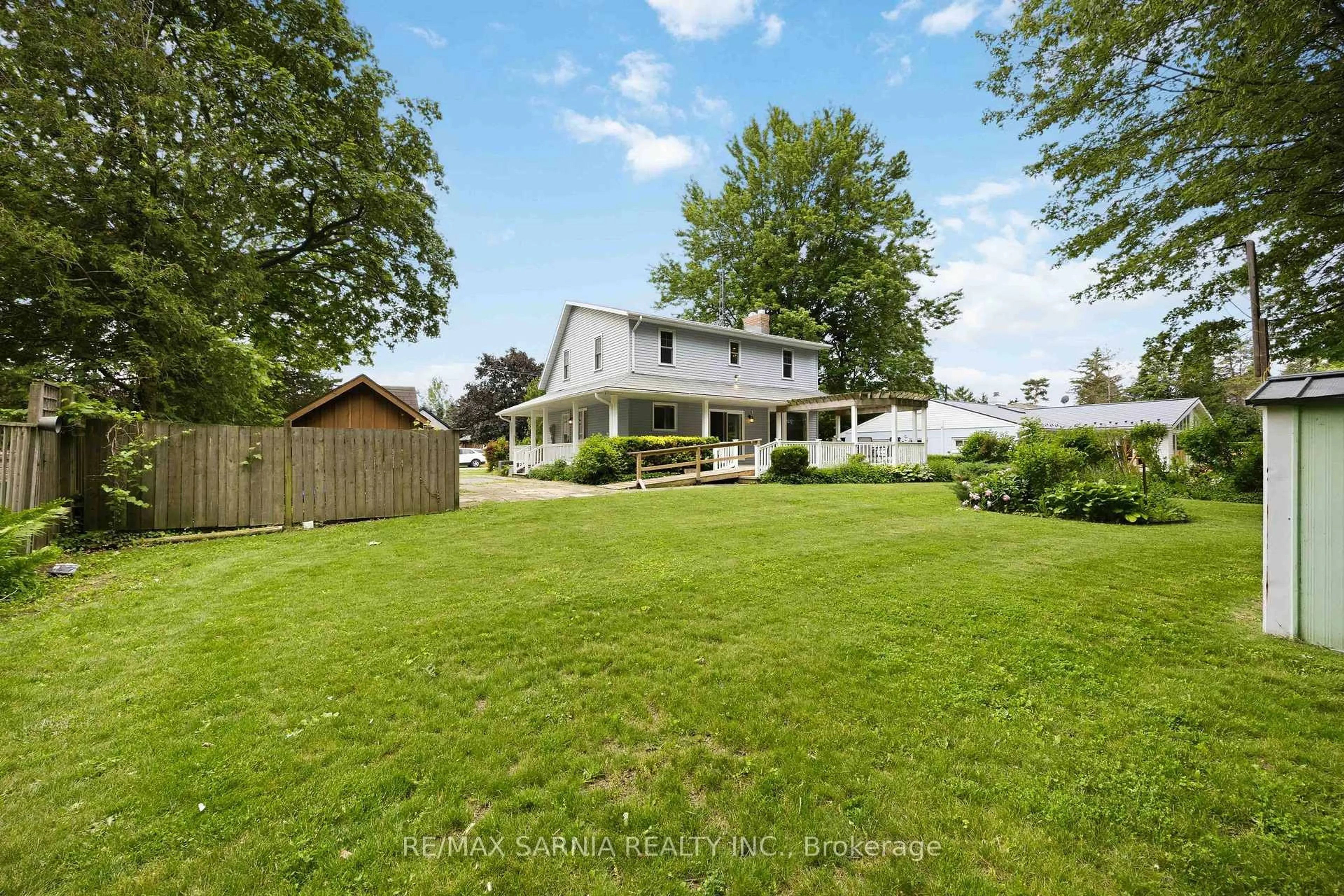 A pic from outside/outdoor area/front of a property/back of a property/a pic from drone, unknown for 4656 Lakeside St, Plympton-Wyoming Ontario N0N 1J0