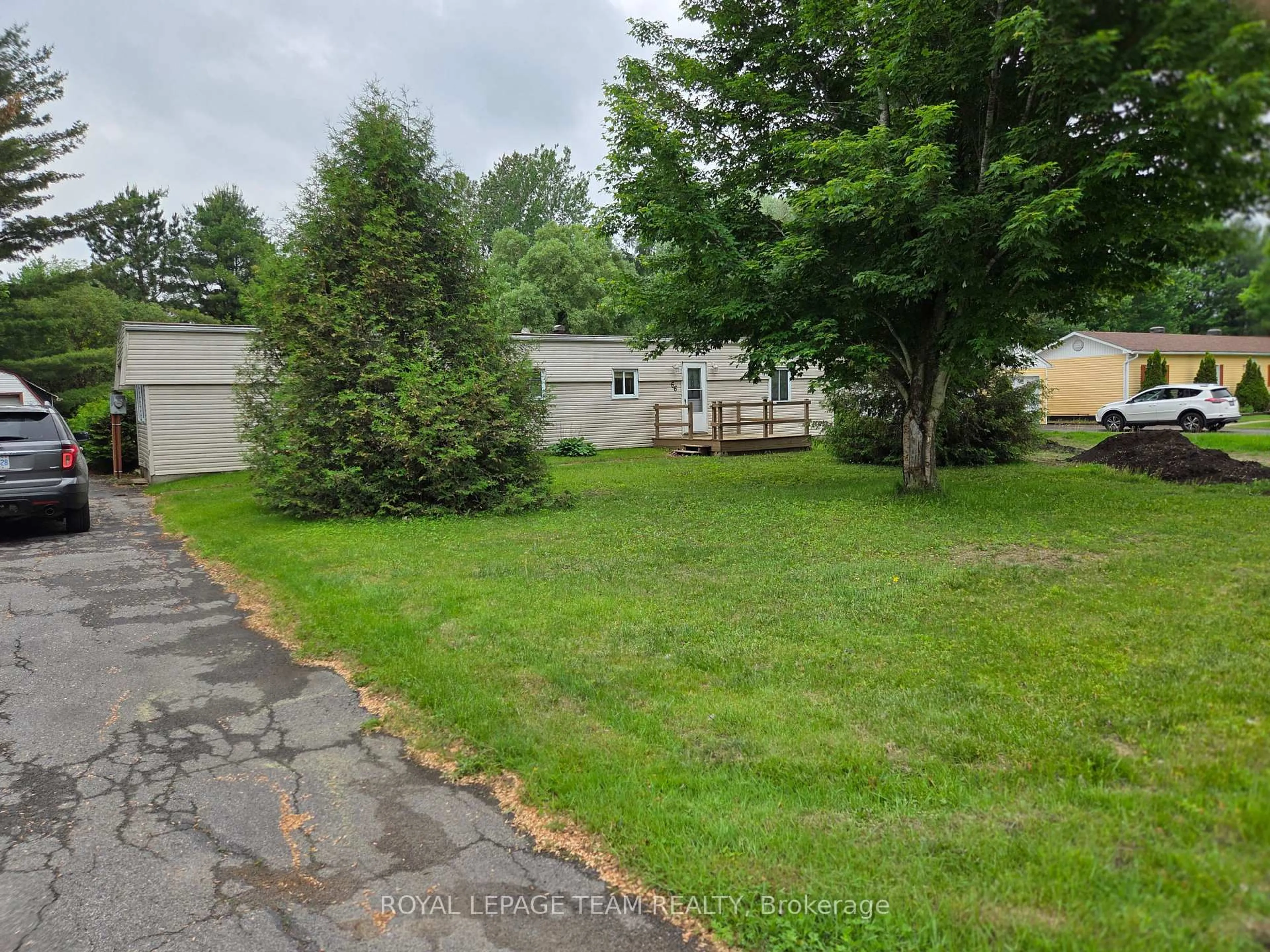 A pic from outside/outdoor area/front of a property/back of a property/a pic from drone, unknown for 5620 Rockdale Rd #66, Vars Ontario K0A 3H0